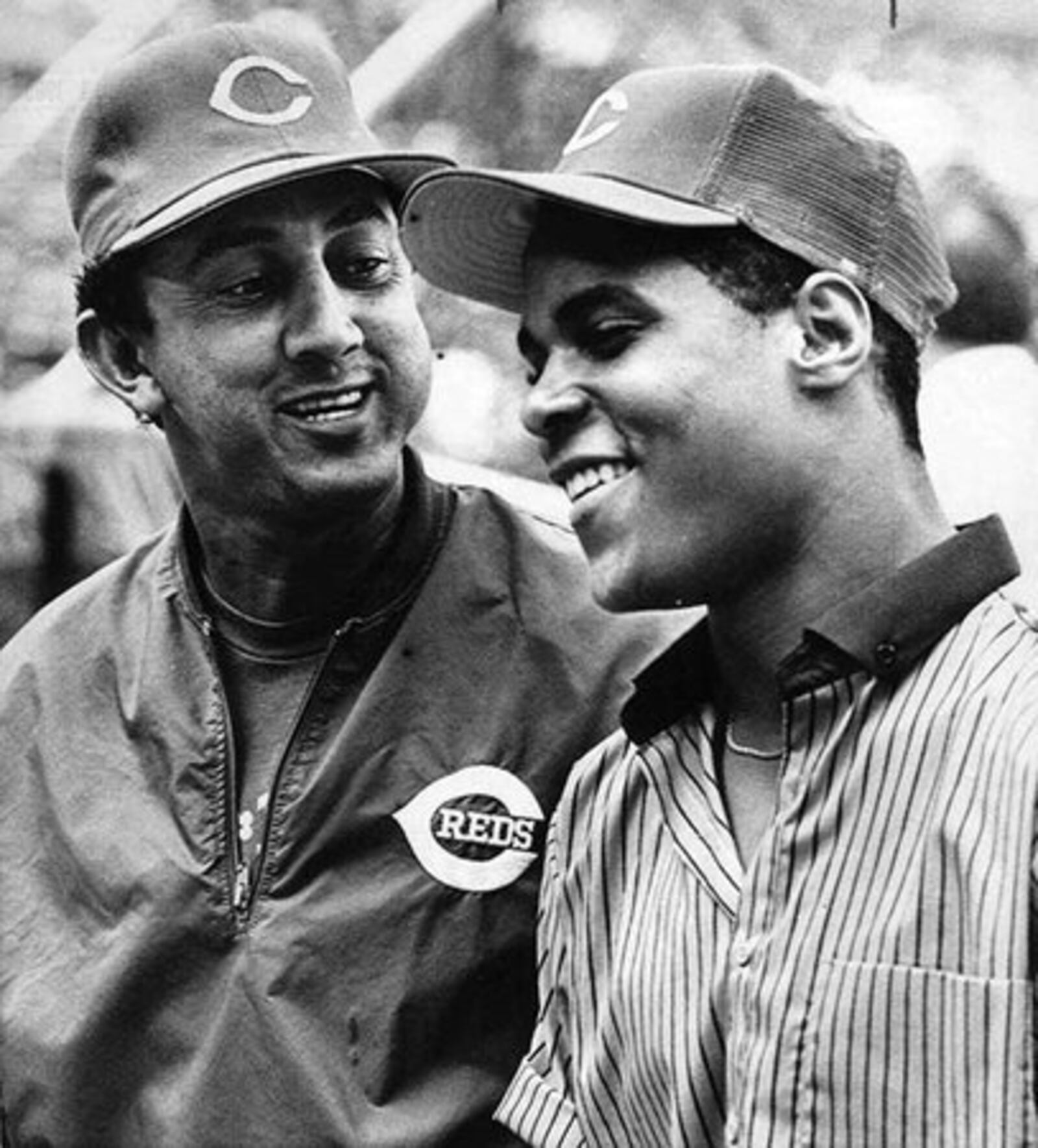 Cincinnati Reds No. 1 draft choice, Barry Larkin, right, a shortstop, laughs with current shortstop Dave Concepcion at a press conference prior to the Reds game June 8, 1985 which announced Larkin has signed a contract with the National League club.