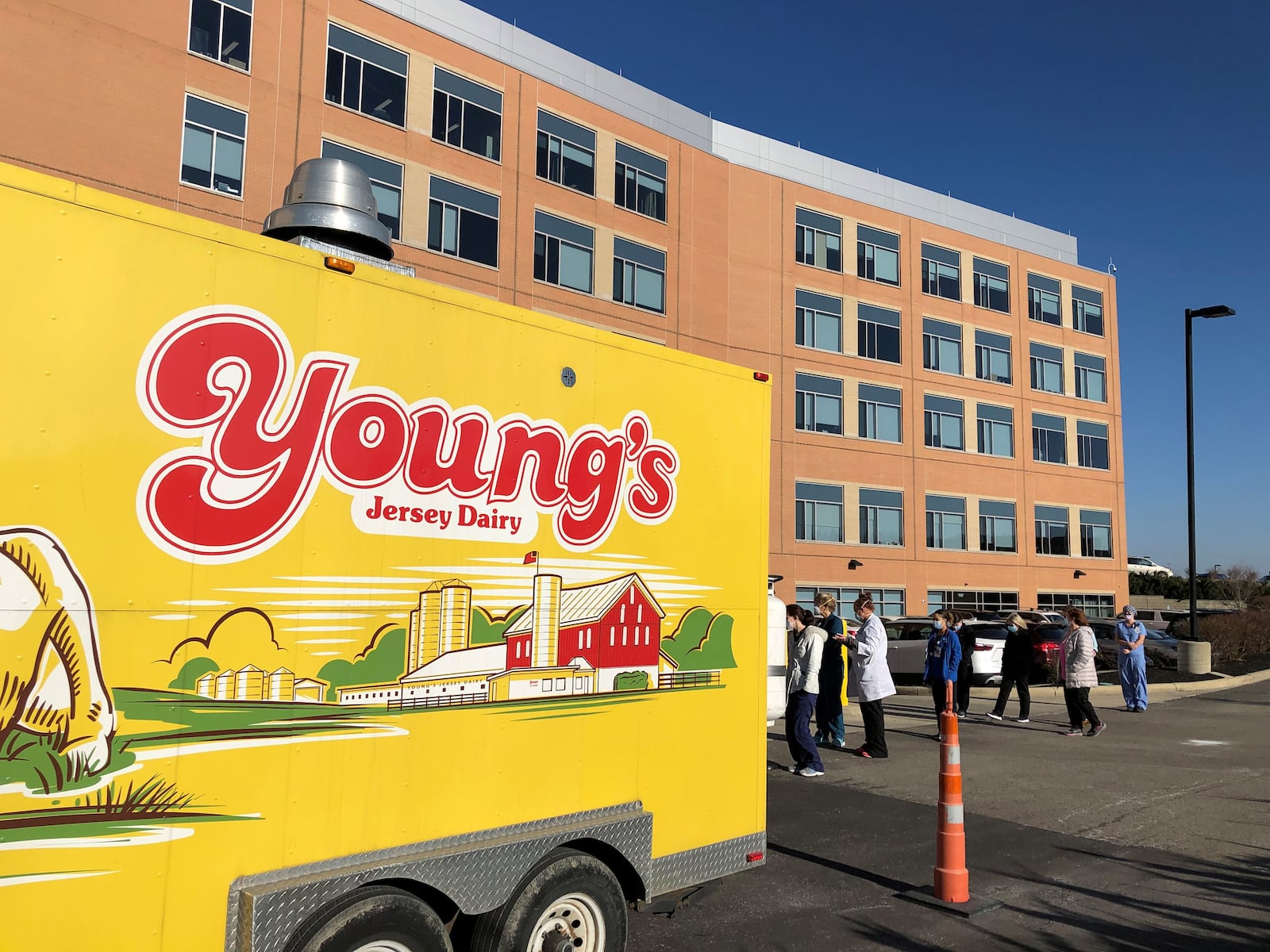 Young's Dairy has been giving away ice cream and cheese curds to frontline medical workers. On Wednesday, they were at Soin Medical Center in Beavercreek. STAFF/BONNIE MEIBERS