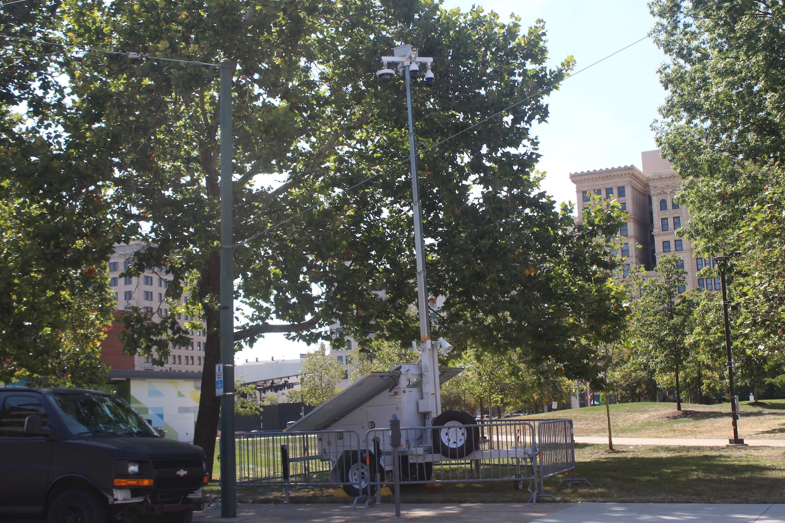 Dayton police placed a mobile surveillance trailer at the southwest corner of the intersection of East Fourth and South Jefferson streets on Wednesday, Sept. 20, 2023. The trailer, which has cameras on the top of a tall pole, was parked at that location one day after two people were shot on the 100 block of South Jefferson Street. CORNELIUS FROLIK / STAFF