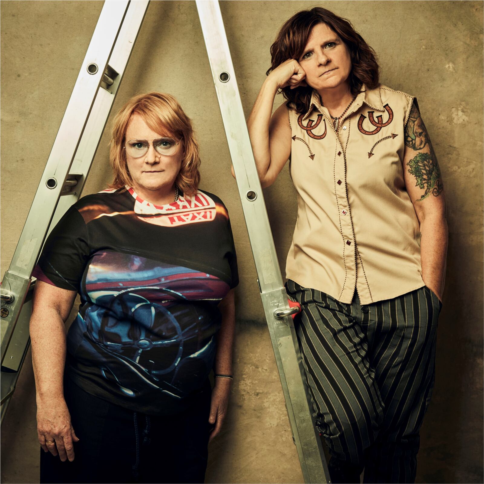 Amy Ray (right) and Emily Saliers of Indigo Girls, who have dates with Melissa Etheridge in August and Amos Lee in September, perform with opener Ari Hest at Victoria Theatre in Dayton Friday, Feb. 23.