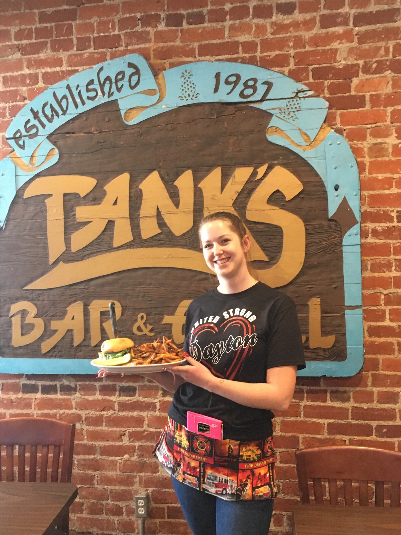 Tank’s Bar and Grill,  2033 Wayne Ave. in Dayton, is selling its  New Holland Beerburger  —a  brown ale beer infused burger on a special bun topped with bacon and  imported blue cheese or white cheddar — as part of a fundraiser in support of the Dayton Faternal Order of Police. The eatery’s effort that includes the sale of a special “Dayton Strong” first responders T-shirt, a silent auction and a  raffle that ends 7 p.m. Monday,  Dec. 23, 2019.