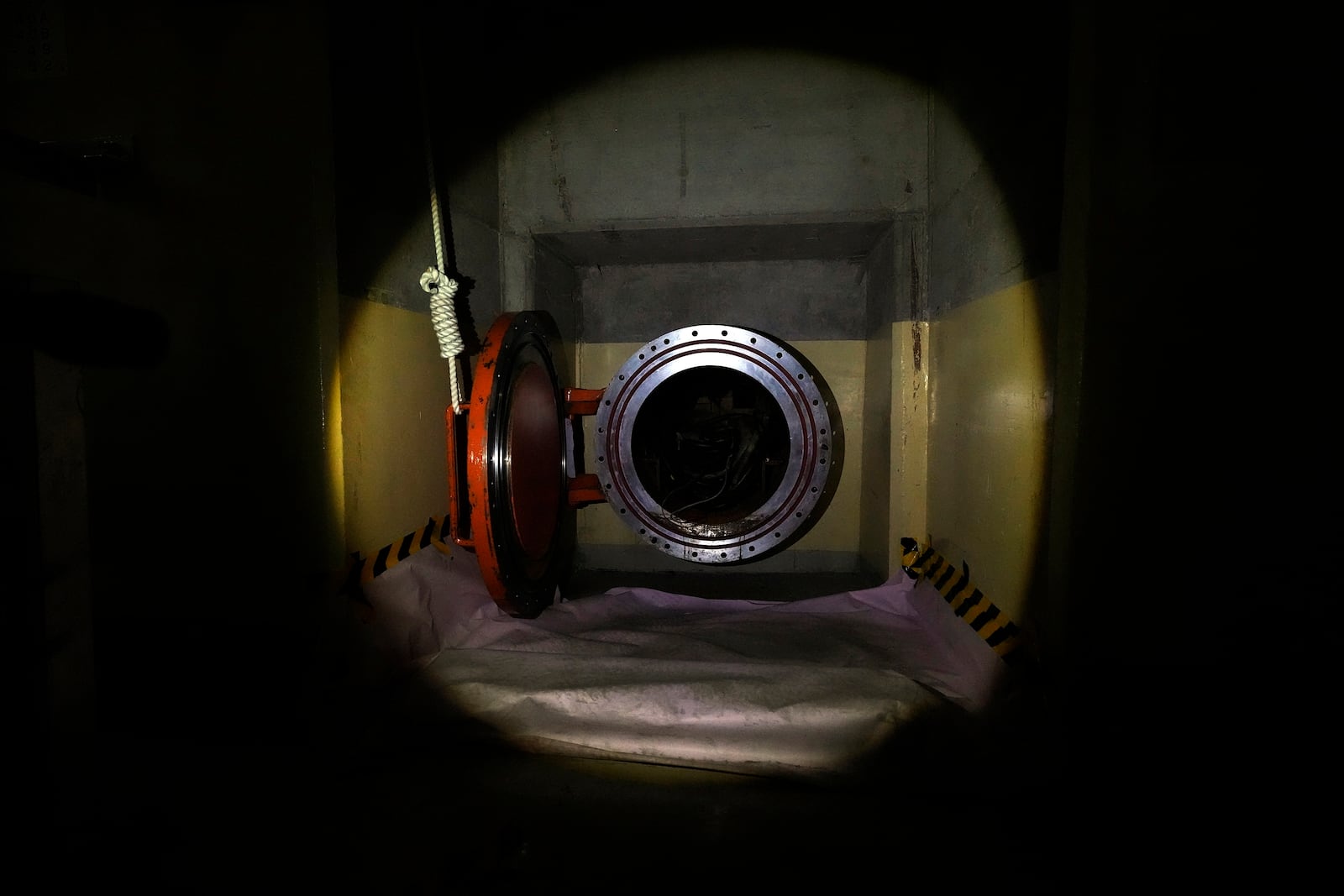 An entry way similar to one at the damaged No. 2 reactor for a melted fuel debris retrieval mission by a remote-controlled robot is seen at the Fukushima Daiichi nuclear power plant, run by TEPCO, in Futaba town, Fukushima prefecture, northeastern Japan, on Monday Feb. 20, 2025. (AP Photo/Eugene Hoshiko)