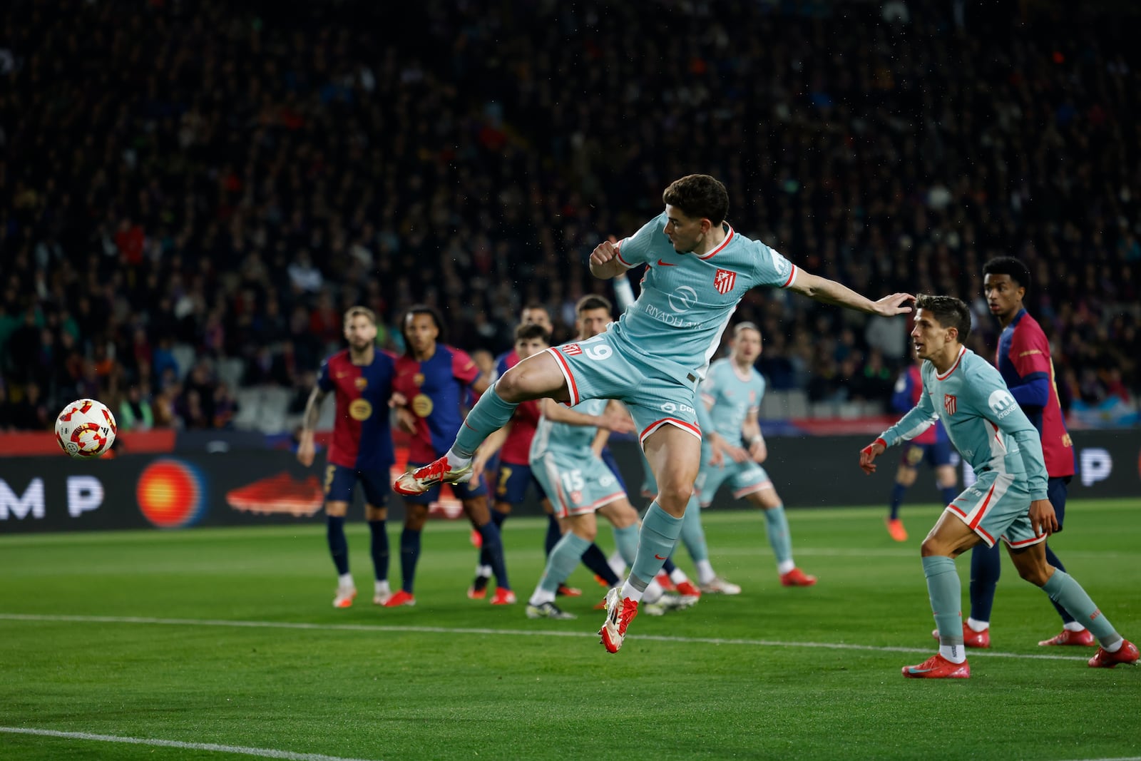 Atletico Madrid's Julian Alvarez scores during a Spanish Copa del Rey, or King's Cup, the semi-final soccer match between Barcelona and Atletico Madrid in Barcelona, Spain, Tuesday, Feb. 25, 2025. AP Photo/Joan Monfort)