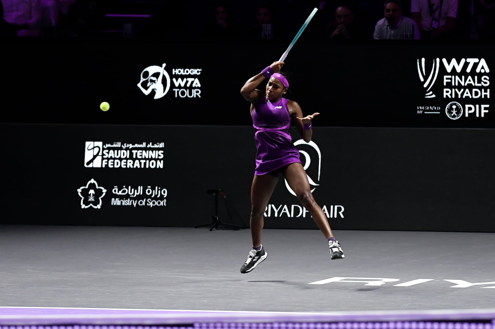 Coco Gauff of the U.S. plays a shot against China's Qinwen Zheng during their women's singles final match of the WTA finals at the King Saud University Indoor Arena, in Riyadh, Saudi Arabia, Saturday, Nov. 9, 2024. (AP Photo)