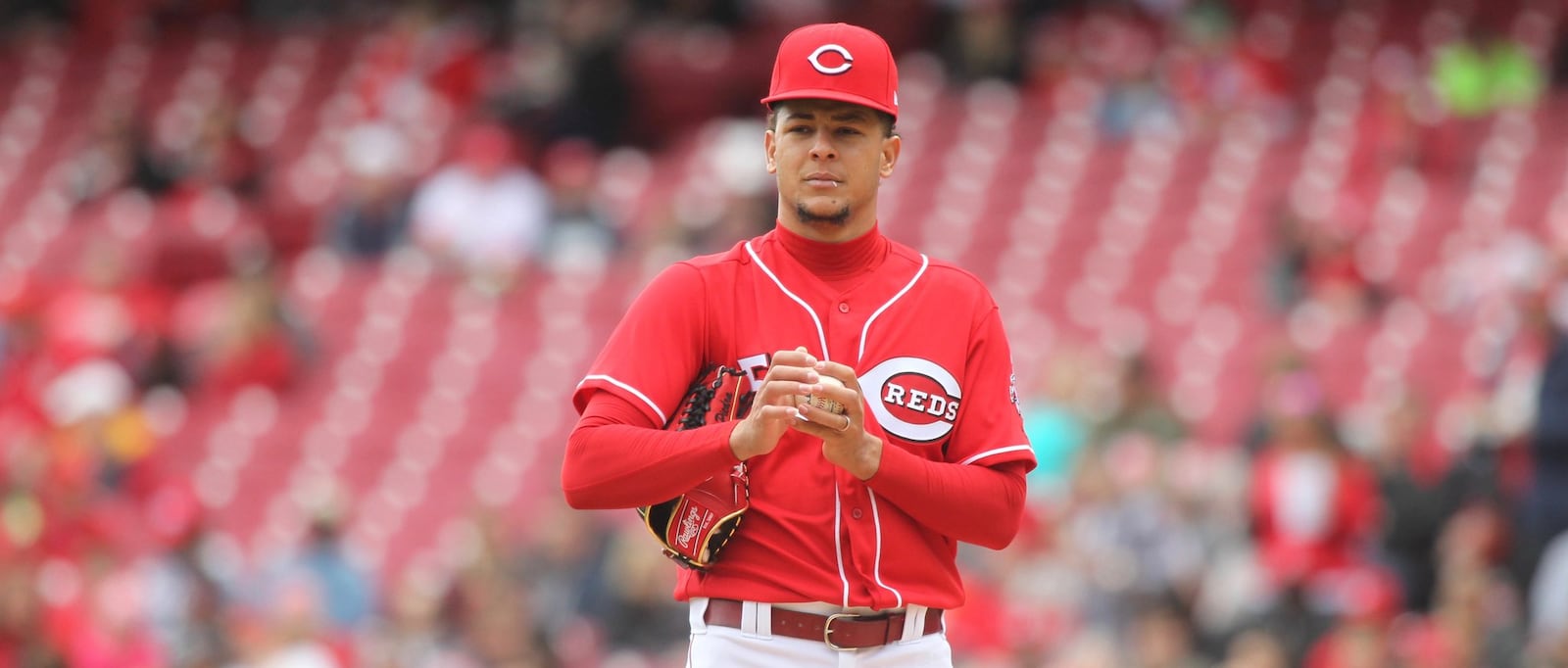 Reds starter Luis Castillo reacts after giving up a home run to the Nationals on March 31, 2018, at Great American Ball Park in Cincinnati. David Jablonski/Staff