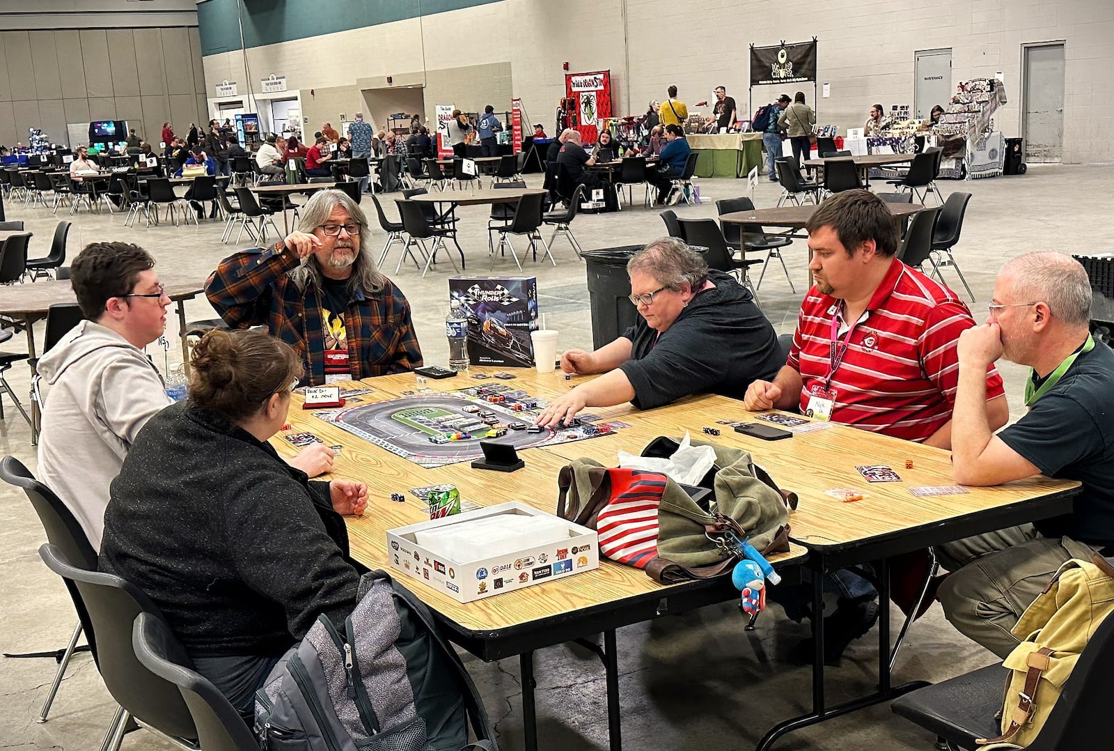 Attendees at AcadeCon 2023 play a board game at the Dayton Convention Center in November 2023. AcadeCon 2024 runs from Nov. 8 to 10, 2024. CONTRIBUTED