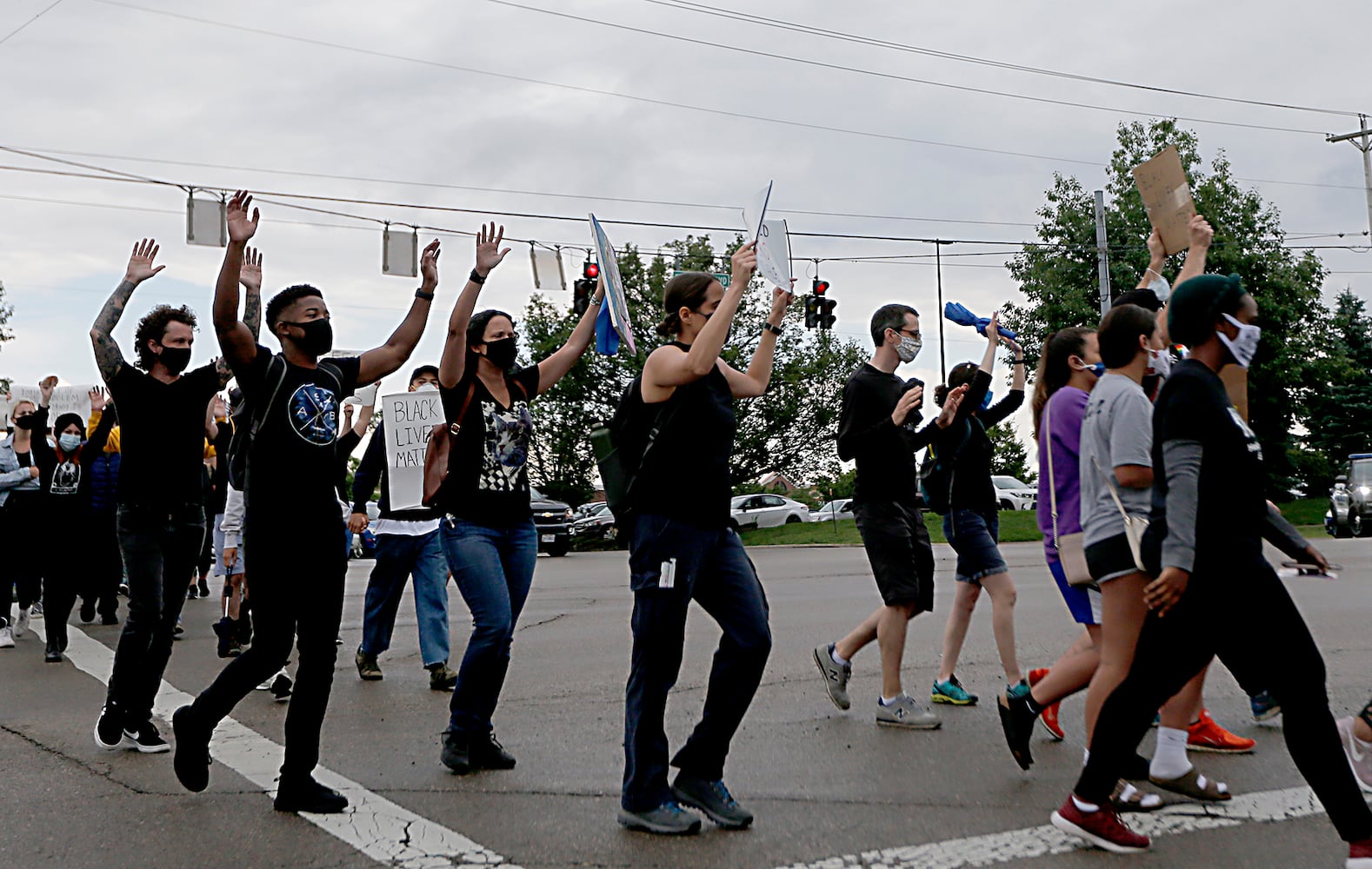 PHOTOS: Demonstrators rally for justice in Beavercreek