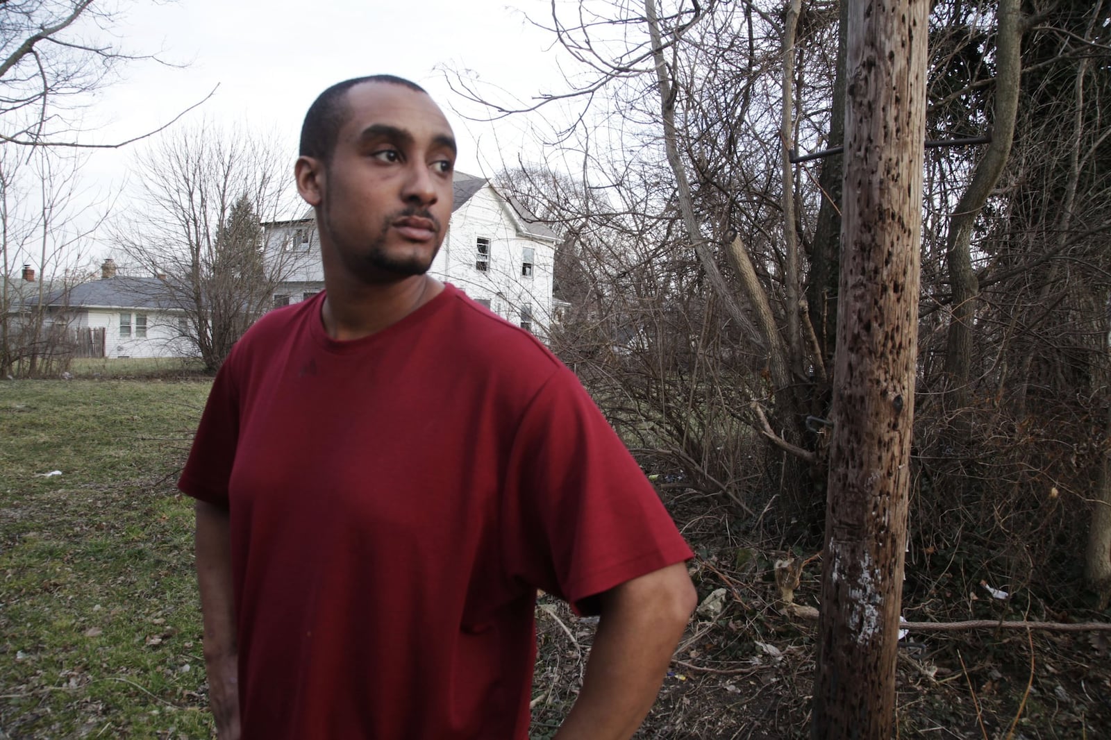 3) Jordan Gonzalez stands near where the body of Kathleen Driscoll, 31, of Dayton was found in the vacant lot next to his 35 Ernst Avenue home in Dayton on Jan. 12, 2018 Driscoll was one of five Dayton women whose bodies were found within a mile’s radius. Residents like Gonzalez have called for police and others to clean up the area. STAFF Byron Stirsman