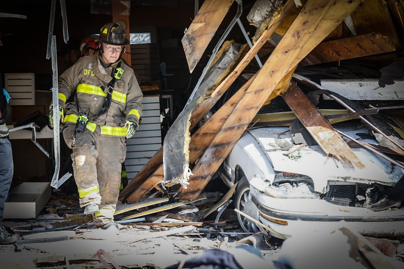 A driver fled the scene after crashing into an unoccupied business at West Third Street between Crown Avenue and Liscum Drive in Dayton Monday afternoon. No injuries were reported, according to Dayton police. JIM NOELKER/STAFF