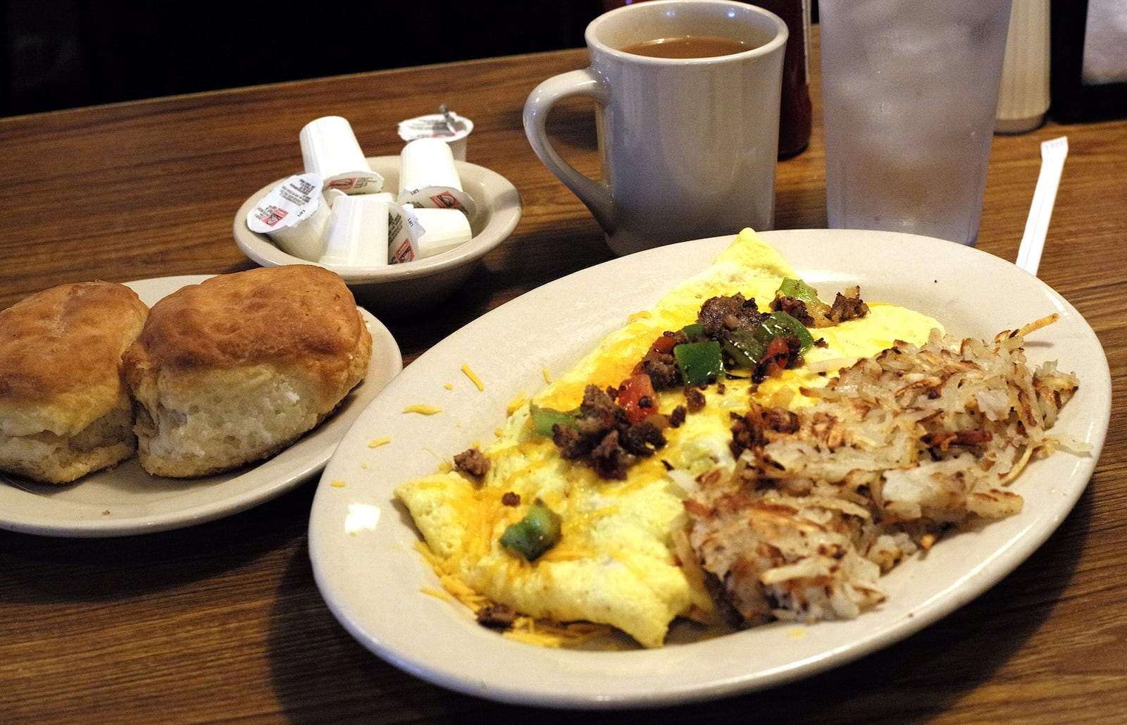 The Mel-O-Dee Omelette with hashbrowns and biscuits and coffee. Bill Lackey/Staff