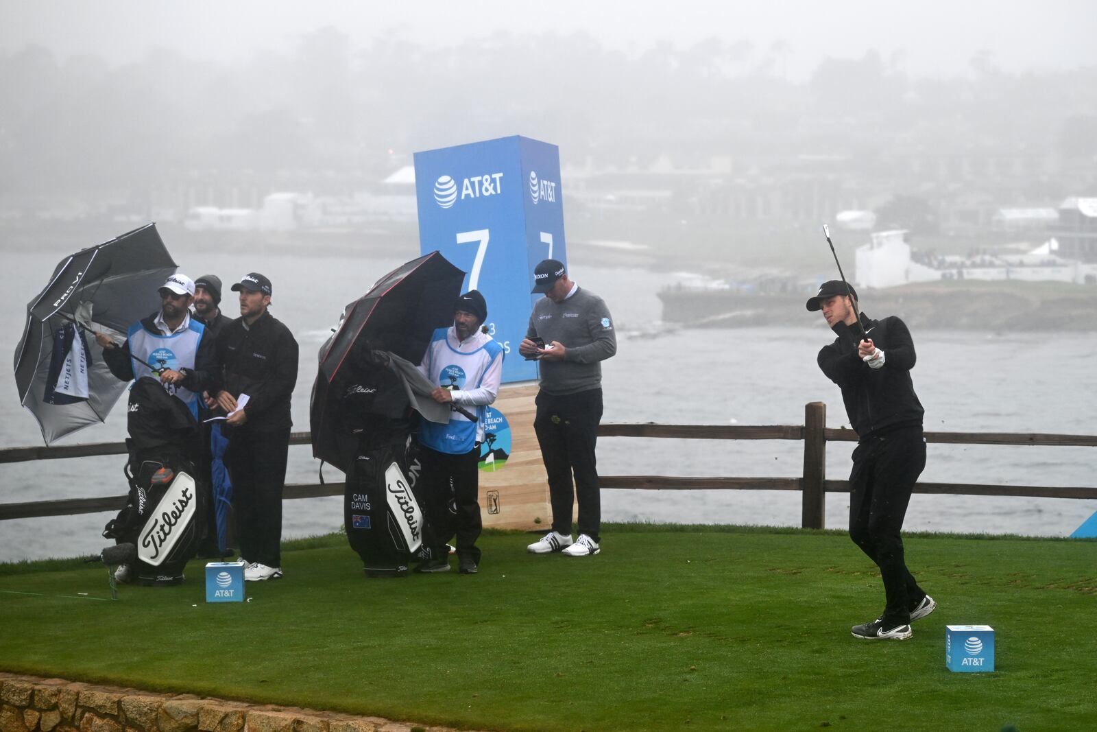 Cam Davis, of Australia, hits his tee shot on the seventh hole at Pebble Beach Golf Links during the third round of the AT&T Pebble Beach Pro-Am golf tournament, Saturday, Feb. 1, 2025, in Pebble Beach, Calif. (AP Photo/Nic Coury)