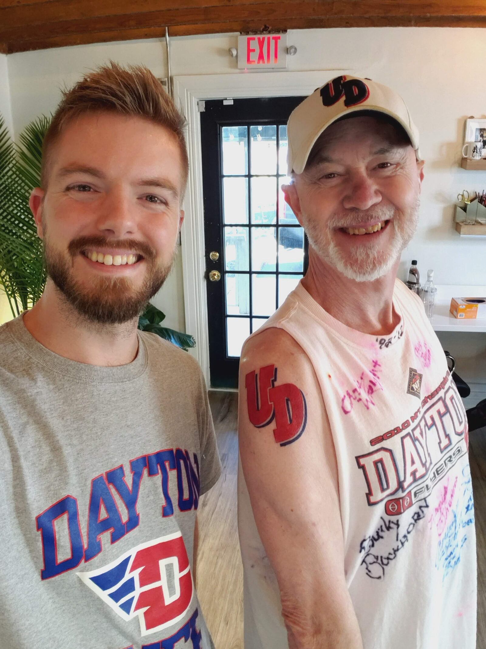 Mark Haufe (right) with Aisle 9 tattoo artist Evan Chandler, who has done most of Haufe’s  portrait pieces. CONTRIBUTED