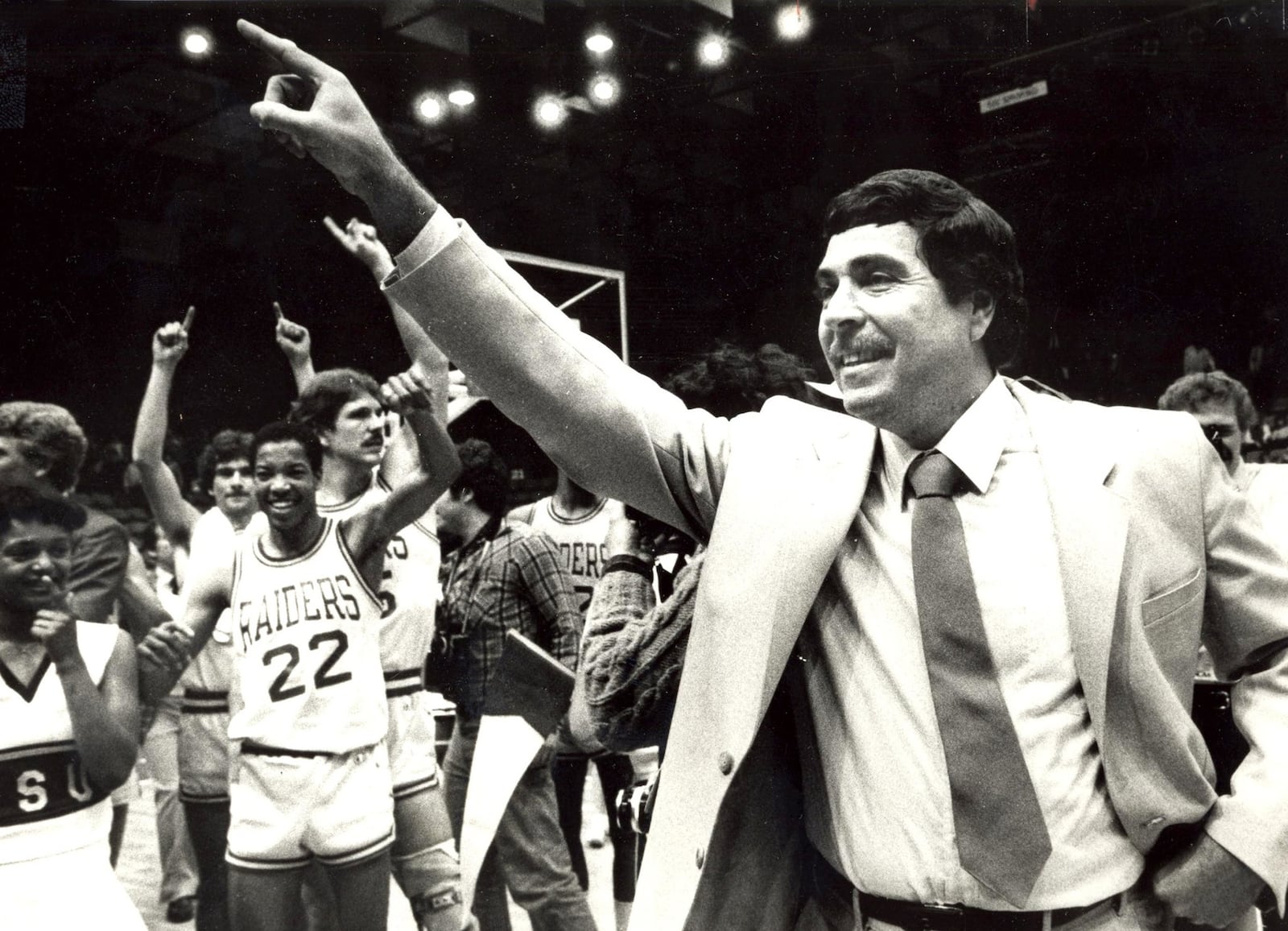 Wright State University coach Ralph Underhill celebrates after the Raiders won the 1983 DII National Championship. DAYTON DAILY NEWS ARCHIVE