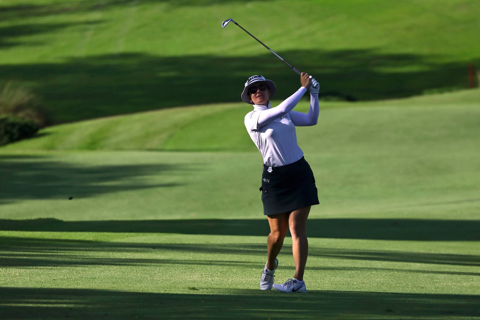 Hannah Green of Australia plays a shot during the round four of the HSBC Women's World Championship 2025 at Sentosa Golf Club in Singapore, Sunday, March 2, 2025. (AP Photo/Suhaimi Abdullah)