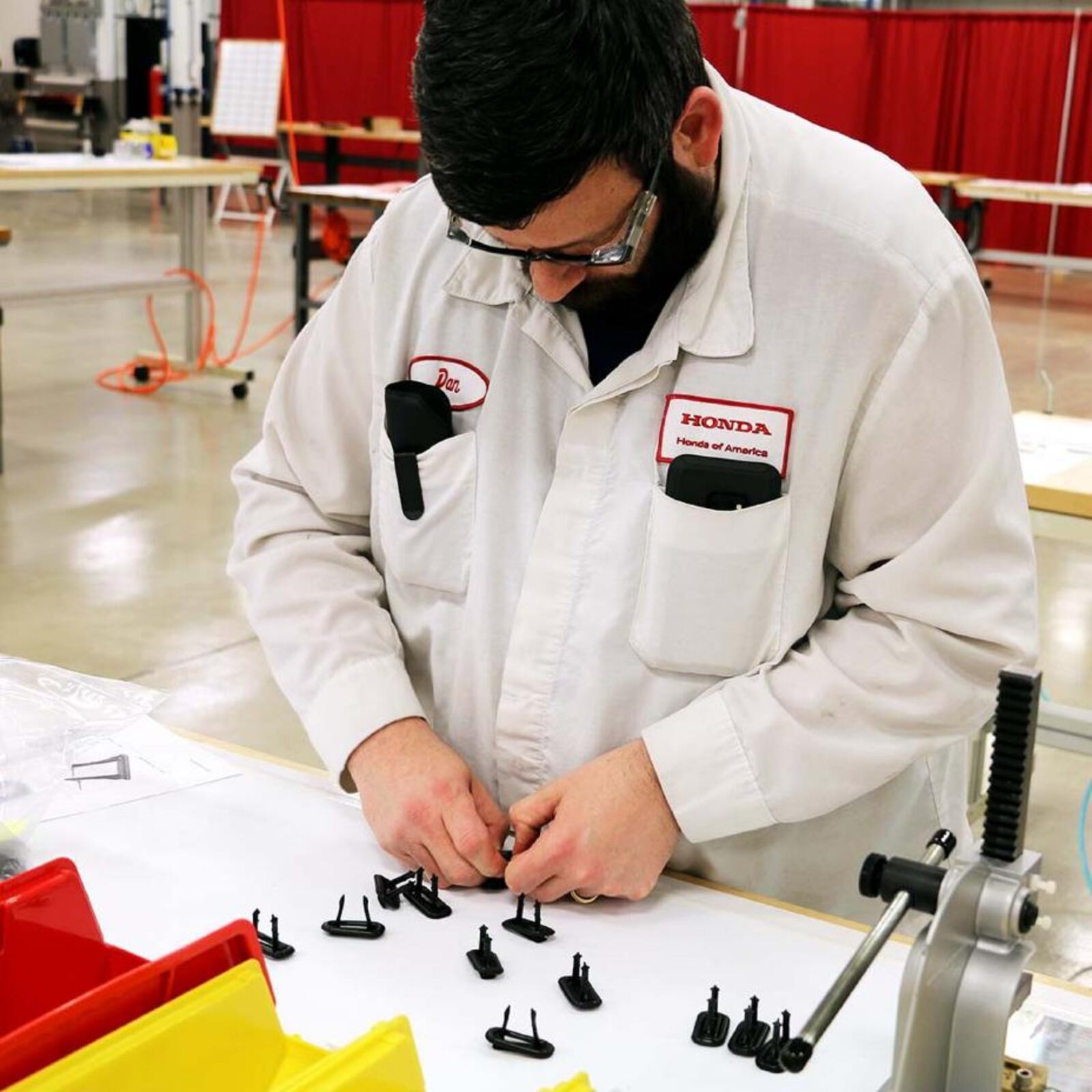 A Honda employee works on compressor components for ventilators in Marysville. CONTRIBUTED