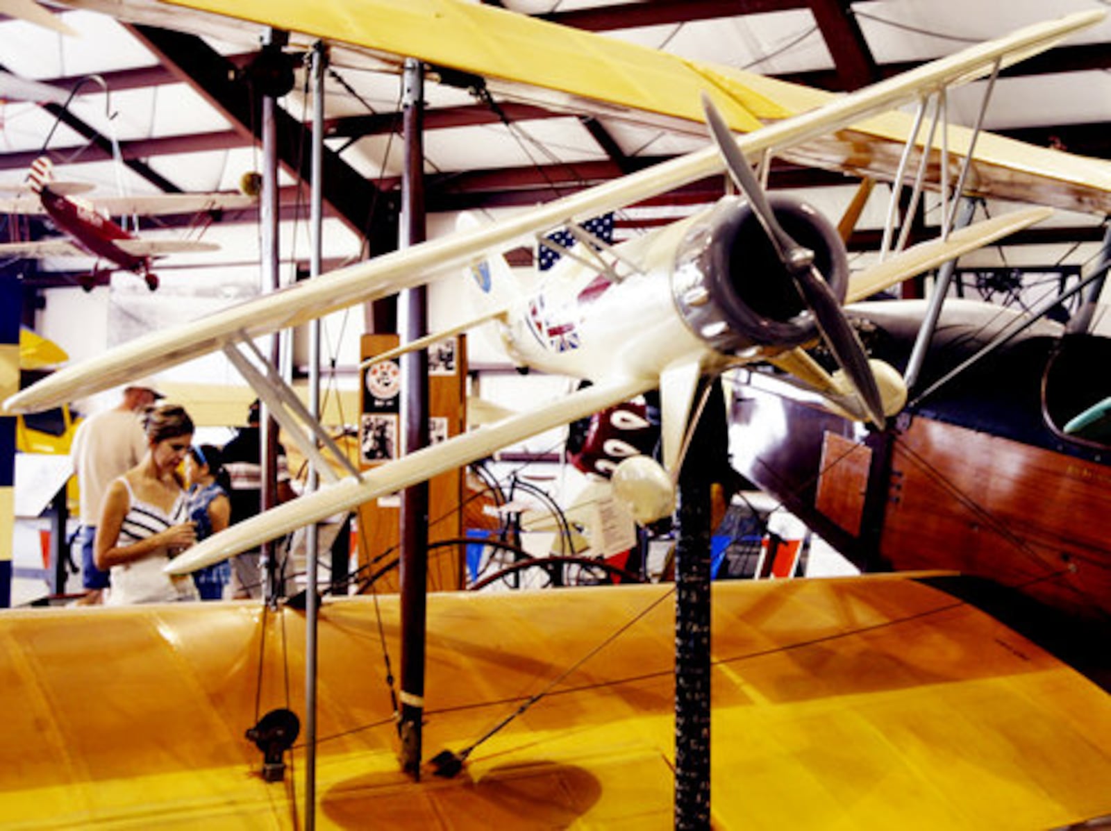 Visitors walk the museum during the WACO Homecoming Fly-In in Troy on Sunday, Sept. 21. The three days event is to welcome WACO planes to their "home" Troy, Ohio, where they were built until the 1940s.