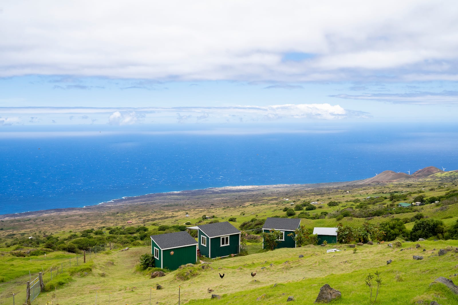 Homes in Kahikinui homestead spread across the southern slope of Kahikinui are pictured on Sunday, July 7, 2024, in Kula, Hawaii. (AP Photo/Mengshin Lin)