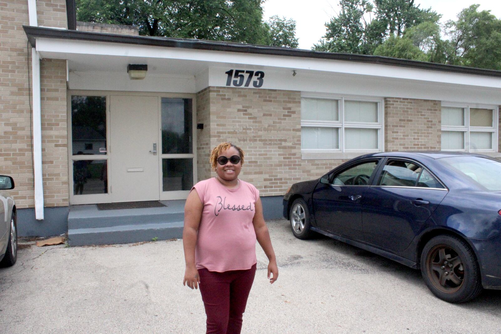 SoLoved founder Ashley Browning outside of 1573 Guenther Road in Trotwood. Browning hopes to use the building as a tornado relief hub.