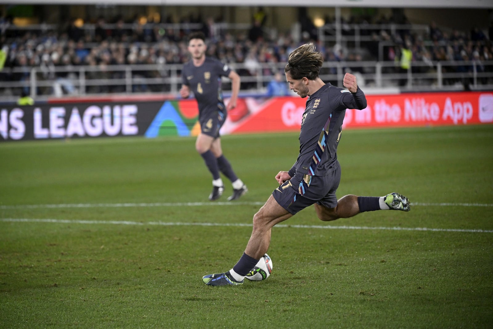 Jack Grealish of England scores the opening goal during the UEFA Nations League soccer match between Finland and England, at the Olympic Stadium in Helsinki, Finland, Sunday, Oct. 13, 2024. (Antti Aimo-Koivisto/Lehtikuva via AP)