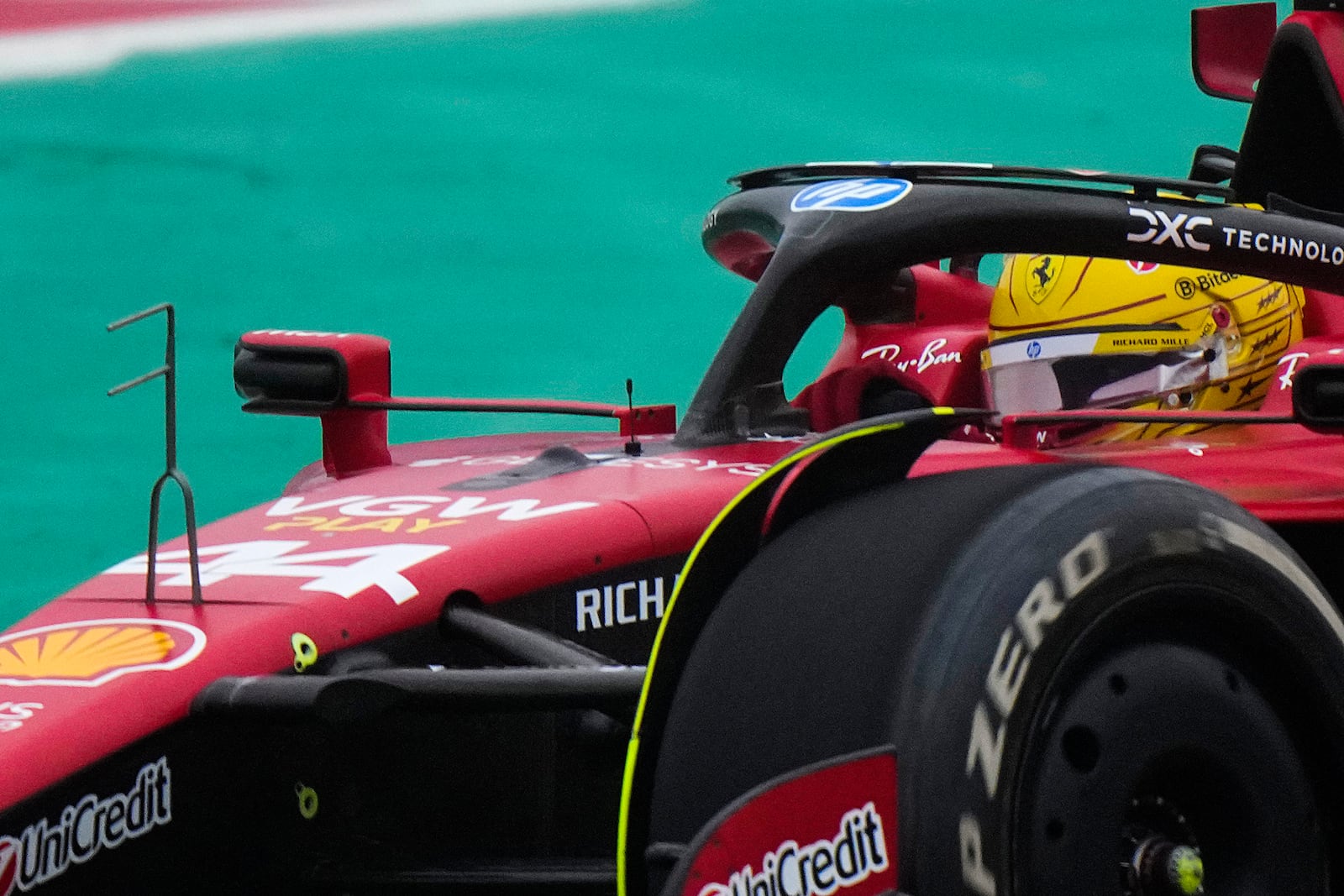 British driver Lewis Hamilton steers a Ferrari Formula One SF-23 at the Ferrari private test track, in Fiorano Modenese, Italy, Wednesday, Jan.22, 2025. (AP Photo/Luca Bruno)