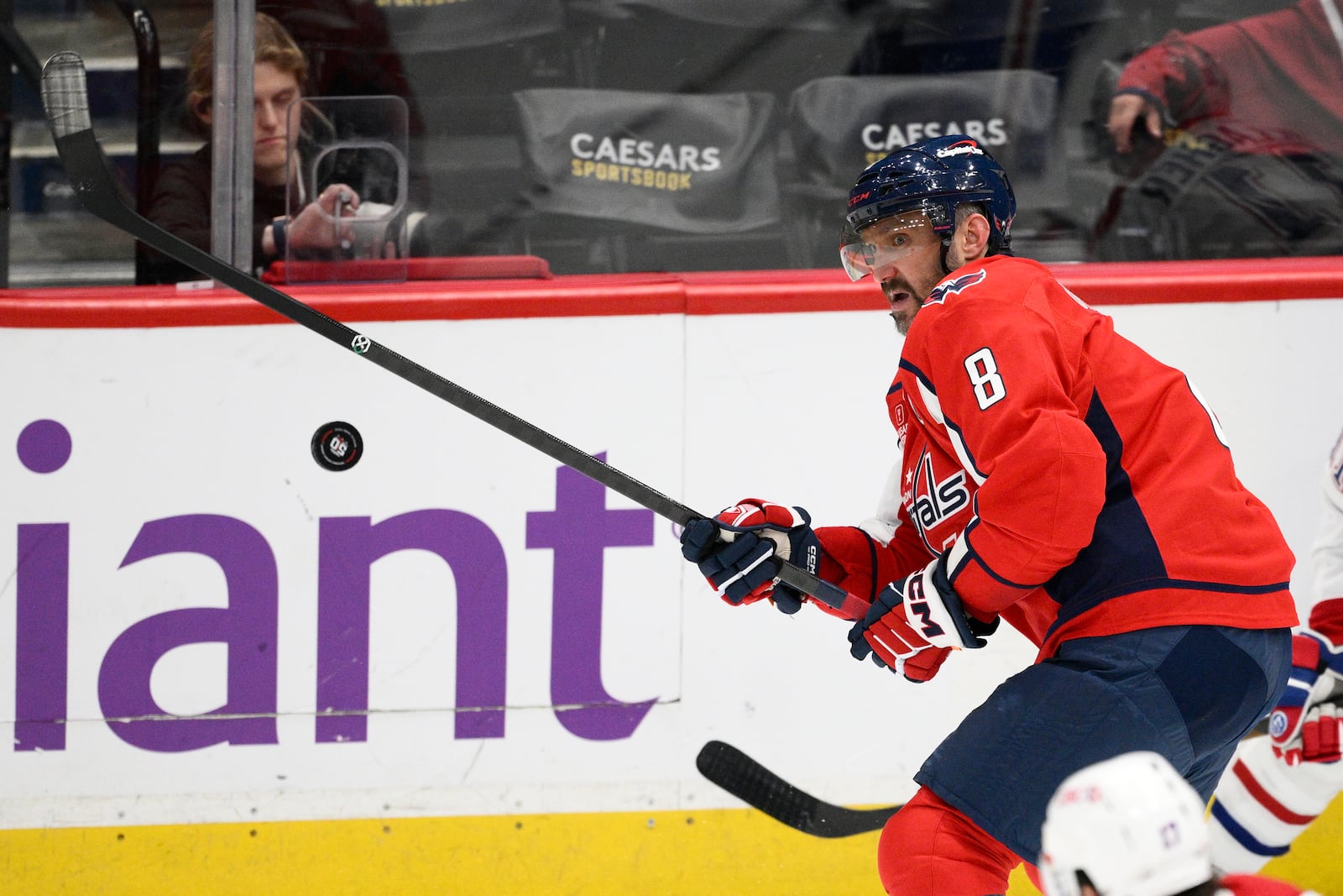 Washington Capitals left wing Alex Ovechkin (8) watches the puck during the third period of an NHL hockey game against the Montreal Canadiens, Thursday, Oct. 31, 2024, in Washington. The Capitals won 6-3. (AP Photo/Nick Wass)