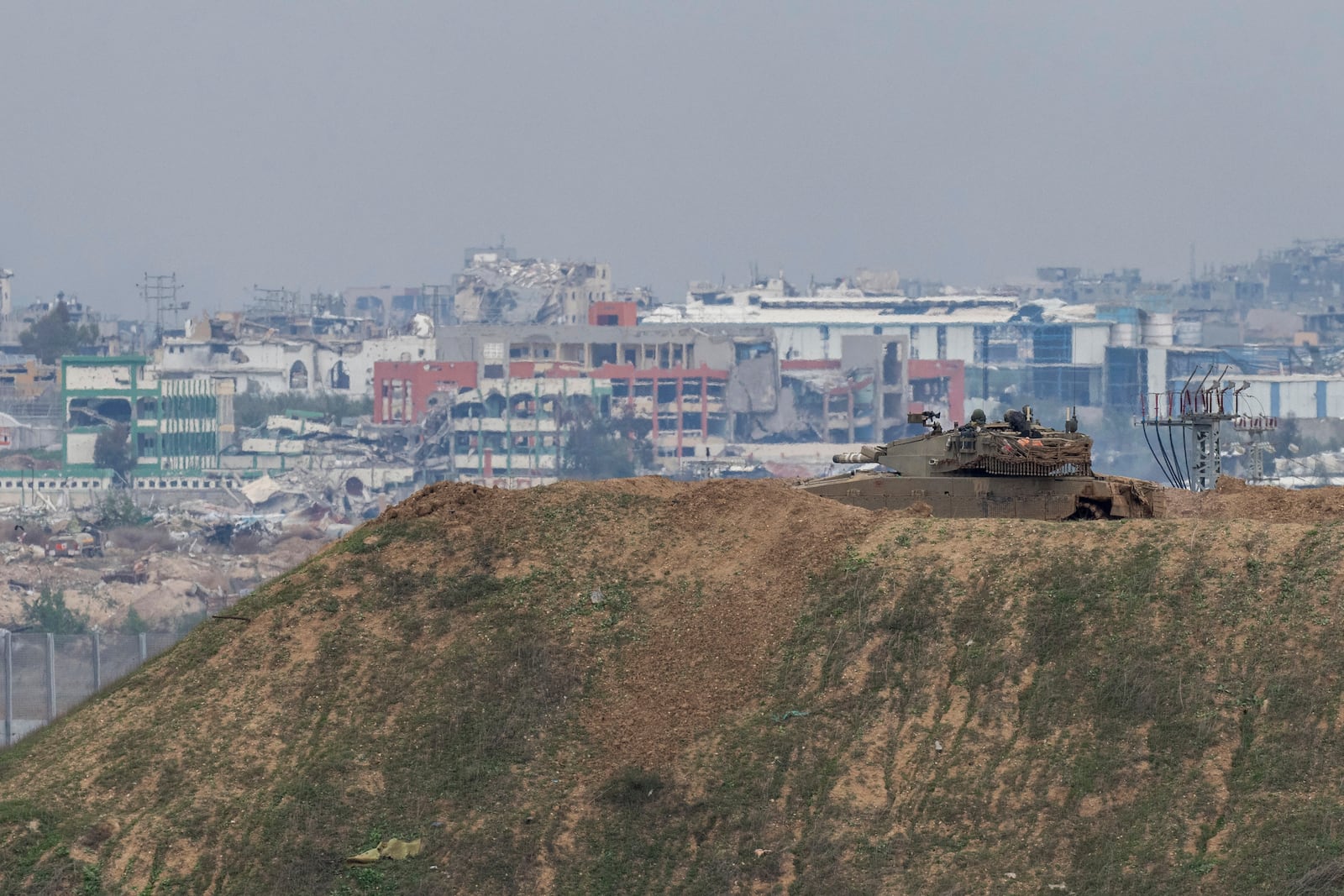 An Israeli tank near the border with Gaza in southern Israel, Sunday, Feb. 9, 2025. (AP Photo/Ohad Zwigenberg)