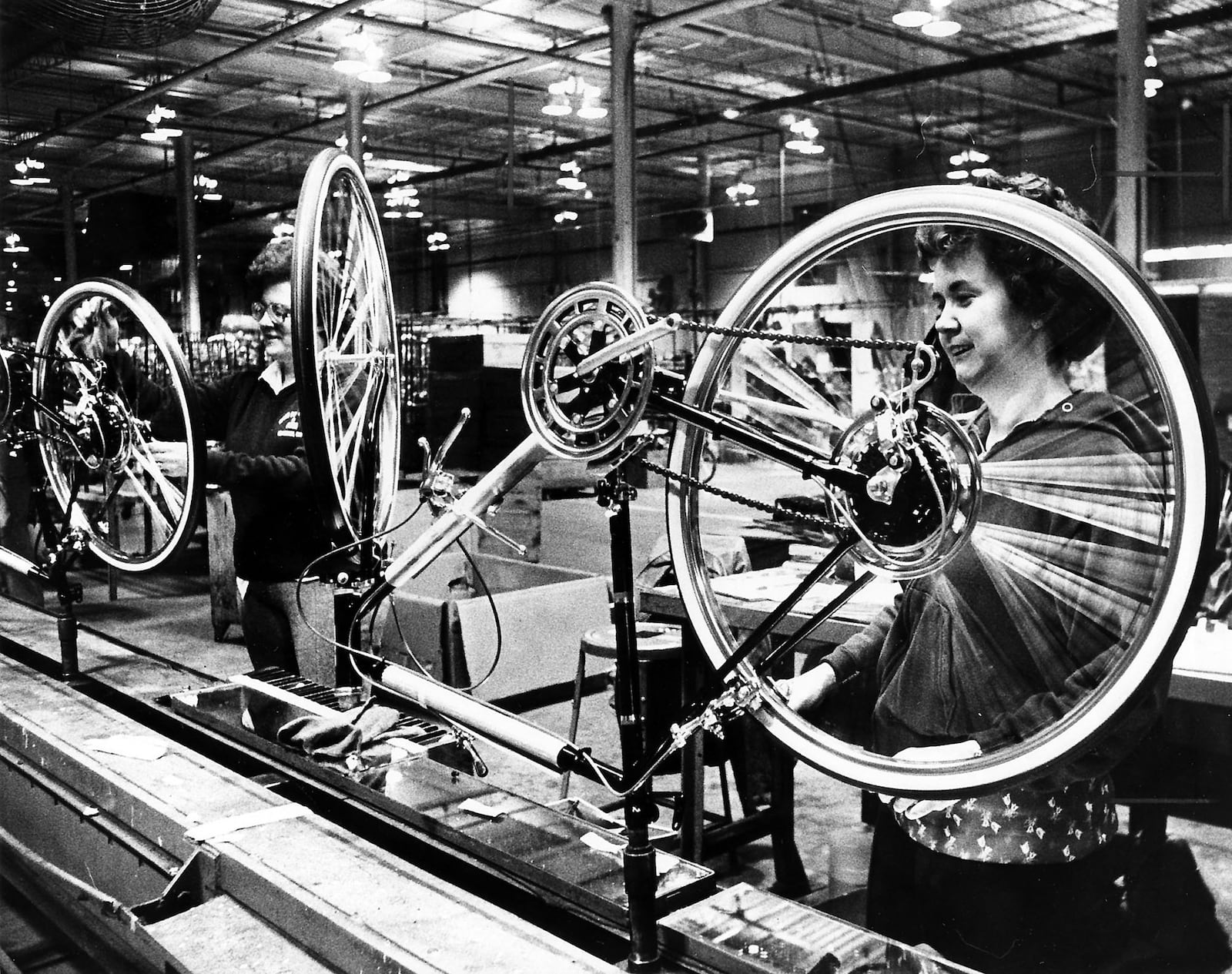 Workers check out bikes at final inspection on Huffy production line in 1980.