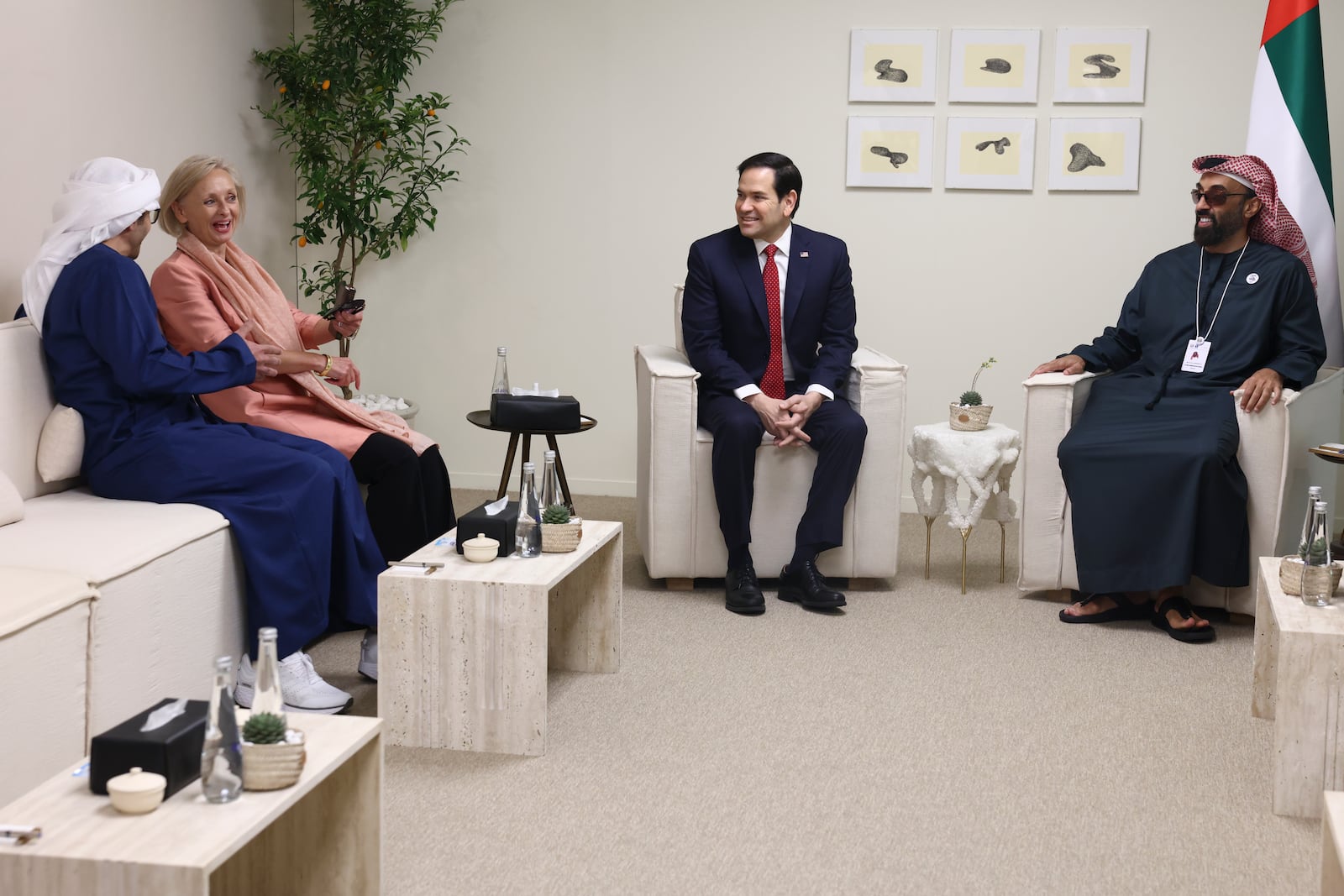 U.S. Secretary of State Marco Rubio, center, interacts with United Arab Emirates Foreign Minister Abdullah bin Zayed Al Nahyan, United States Ambassador to the United Arab Emirates Martina A. Strong and UAE National Security Advisor Sheikh Tahnoon bin Zayed Al Nahyan at ADNEC Centre Abu Dhabi in in Abu Dhabi, United Arab Emirates, Wednesday, Feb. 19, 2025. (Evelyn Hockstein/Pool Photo via AP)