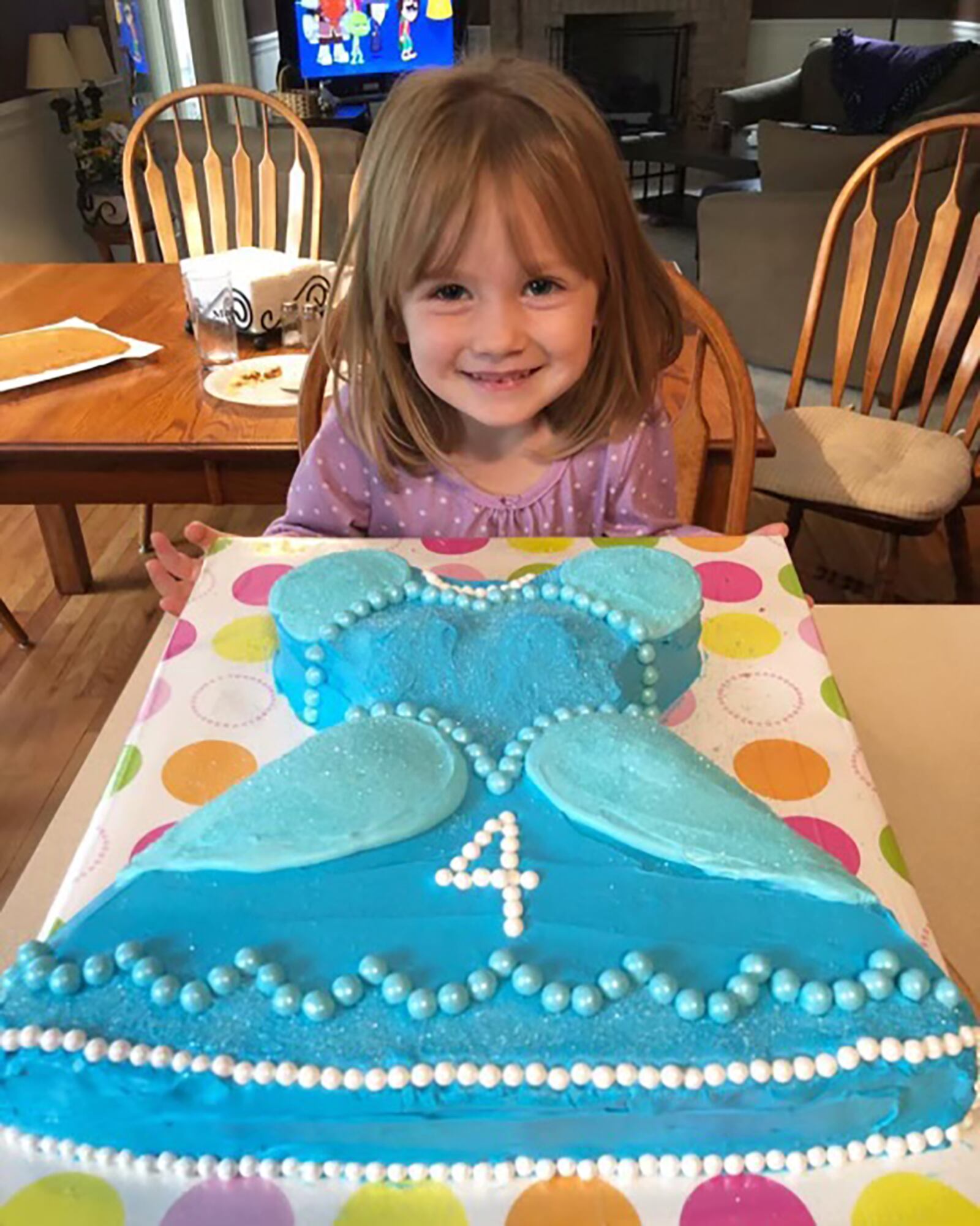 Lily at age 4 with her birthday cake