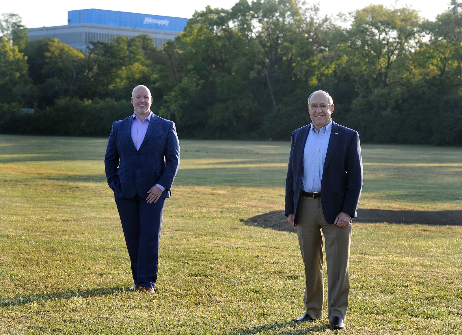 John McKenzie, president of Winsupply Inc., left, Richard Schwartz, chairman of the board, Winsupply Inc., will break ground Wednesday on a new building to be known as the Richard W. Schwartz Center for Innovation, and the new home of Winsupply of Dayton. MARSHALL GORBY\STAFF

