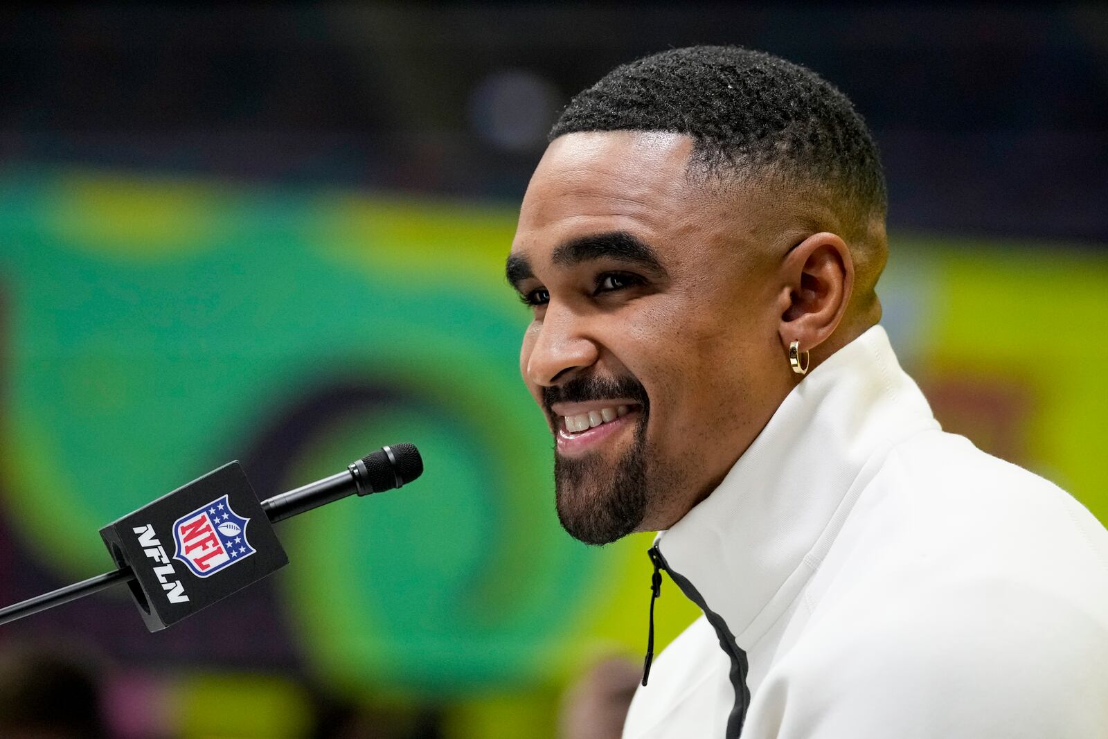 Philadelphia Eagles quarterback Jalen Hurts (1) participates during Super Bowl 59 Opening Night, Monday, Feb. 3, 2025, in New Orleans, ahead of the NFL football game between the Philadelphia Eagles and the Kansas City Chiefs Sunday. (AP Photo/Brynn Anderson )