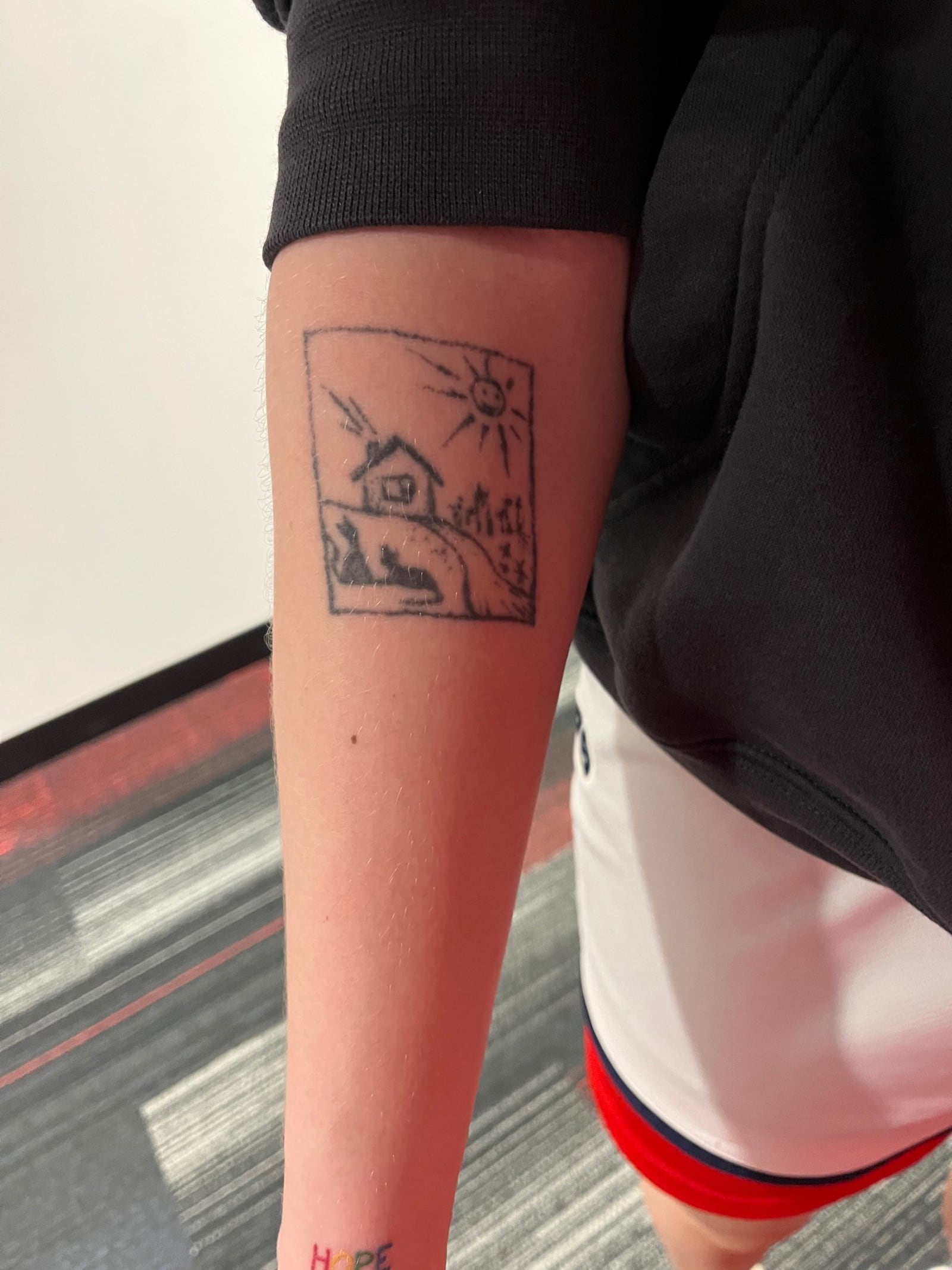 Dayton women's basketball player Taisiya Kozlova's tatoo depicting her home in Moscow, Russia. Ross Bagienski/UD Athletics