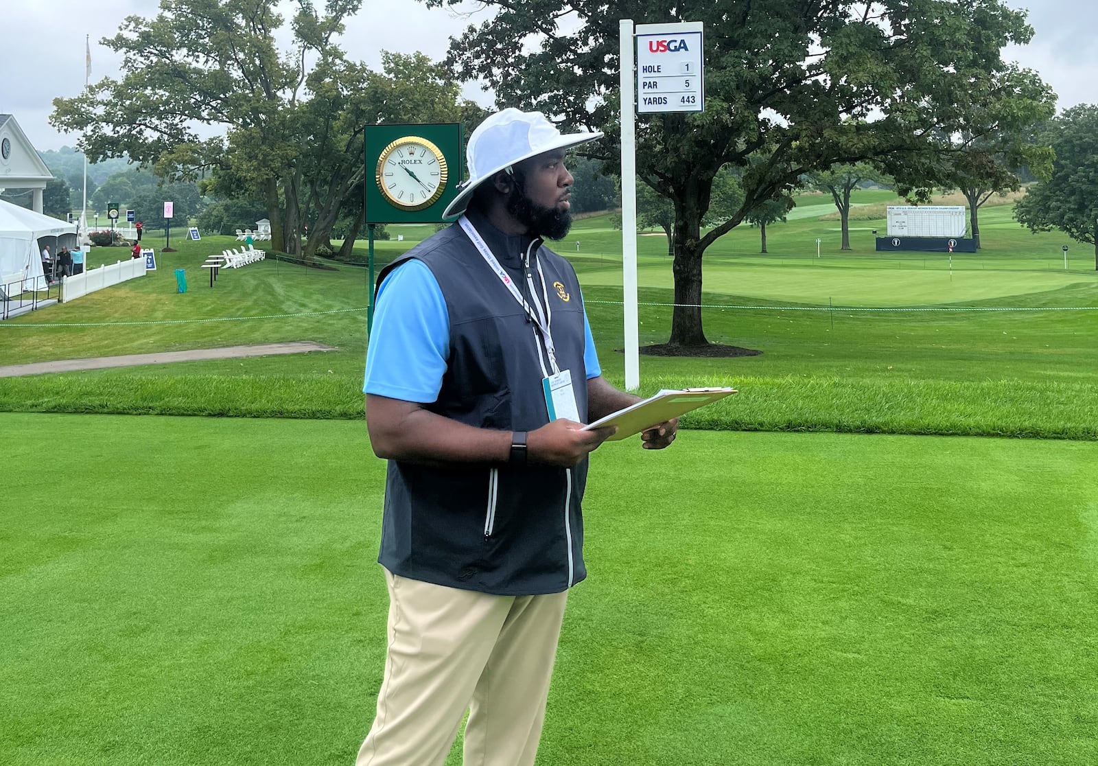 Wilberforce University golf coach Will Ware worked as a volunteer starter this week during a practice round at the U.S. Senior Women’s Open at NCR Country Club’s South course. CONTRIBUTED