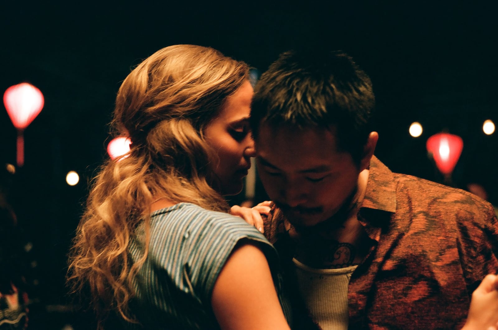 Alicia Vikander (left) stars as "Kathy" and Justin Chon (right) stars as "Antonio" in "Blue Bayou." (Courtesy of Focus Features/TNS)