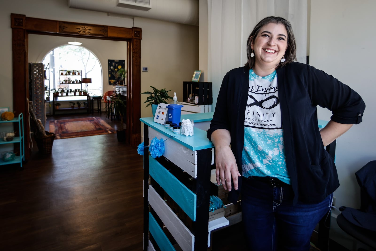 Bonnie Skinner founder of Infinity Soap Company specializes in handcrafted bath and body products at 4 North Main St. in Miamisburg. JIM NOELKER/STAFF