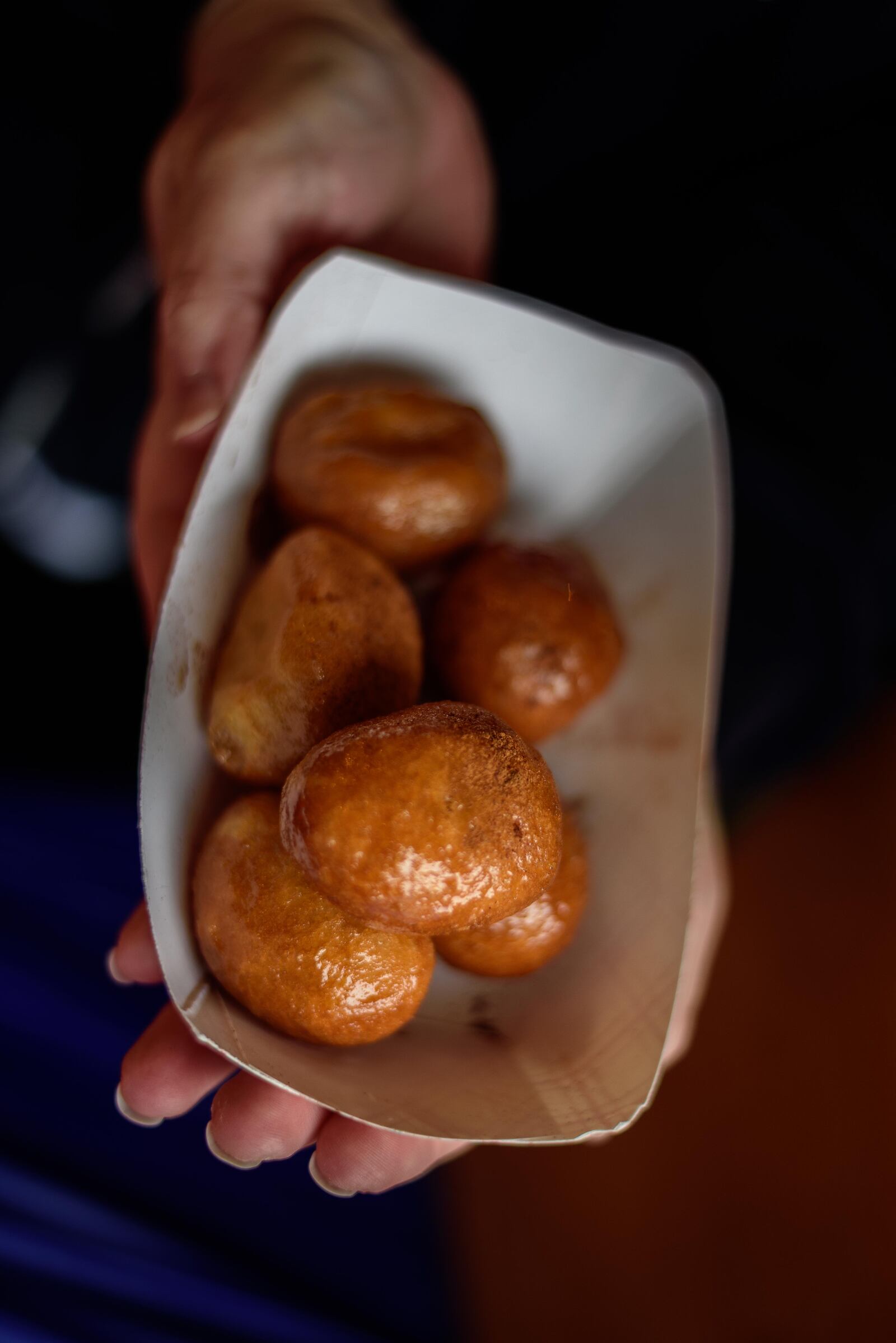 Honey puffs are among the treats enjoyed at the annual Greek Festival. TOM GILLIAM / CONTRIBUTING PHOTOGRAPHER