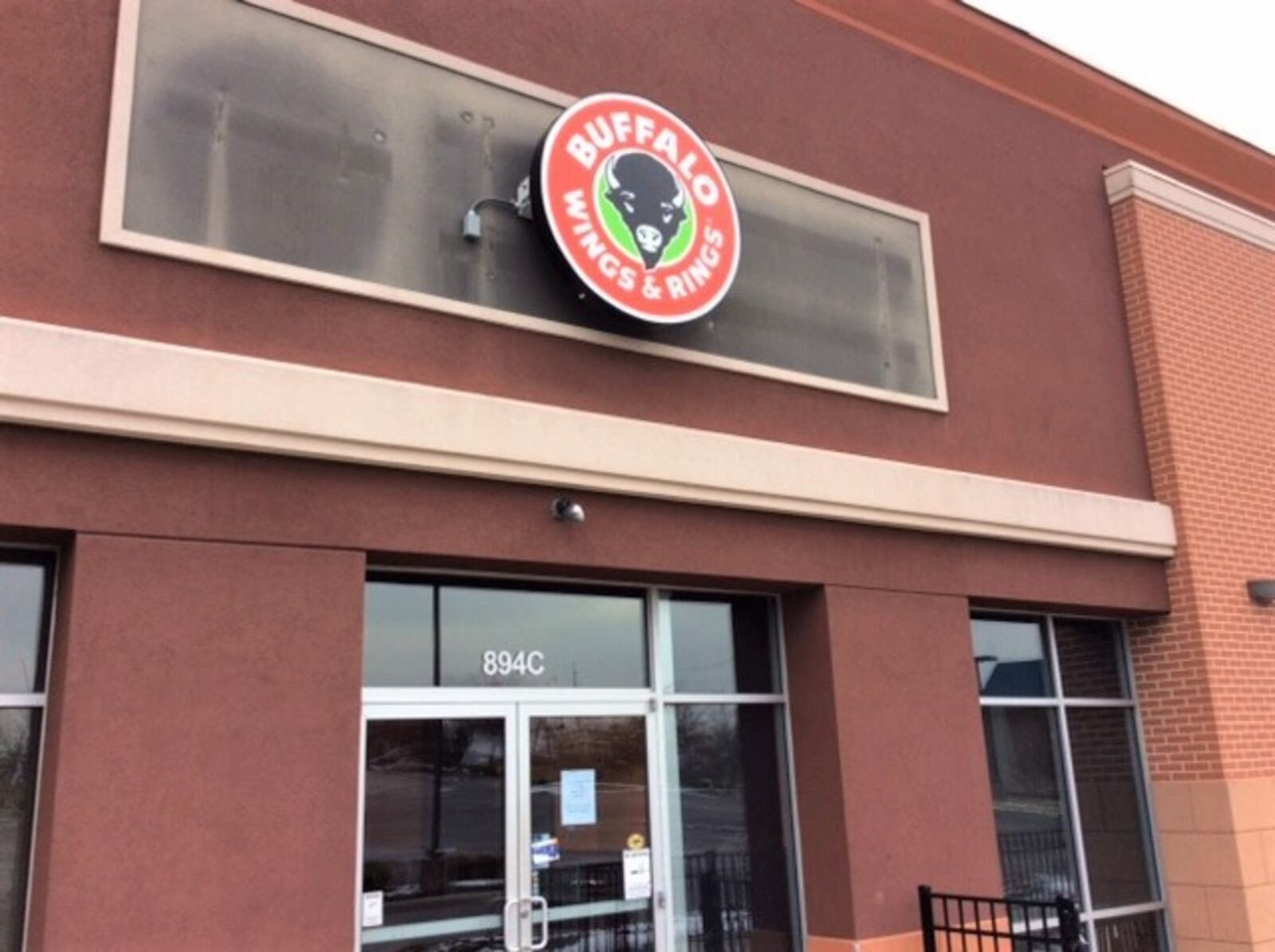 Buffalo Wings & Rings says it will look for a new location in the Dayton area after shutting down this restaurant in the Centerville Square Shopping Center on Monday. MARK FISHER/STAFF