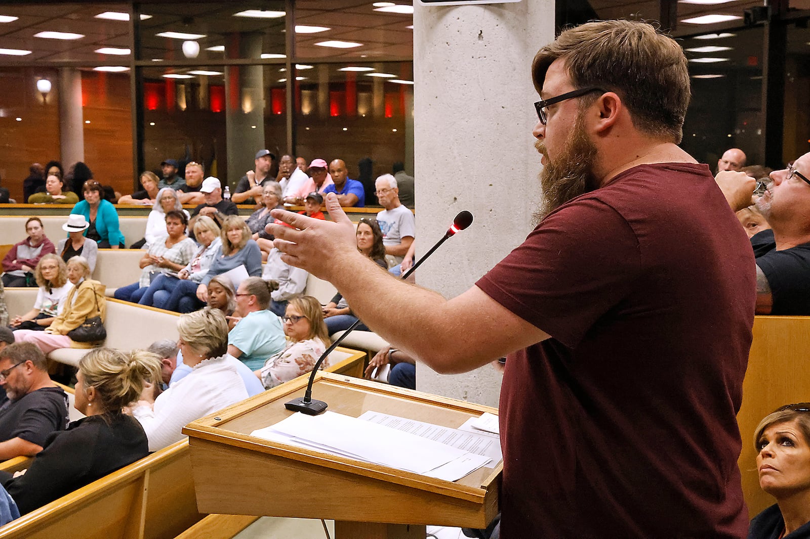 Springfield resident and business owner Brandon Ellis speaks in support of Haitian immigrants at the Springfield City Commission meeting Tuesday, Sept. 12, 2023. BILL LACKEY/STAFF