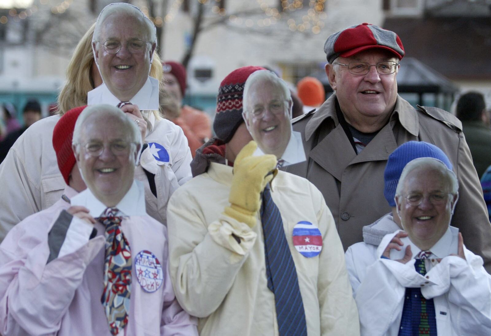 Miamisburg Mayor Dick Church (right) poses with members of the Leyes family after a costume contest that took place before the 30th annual Turkey Trot in Miamisburg in 2008. FILE