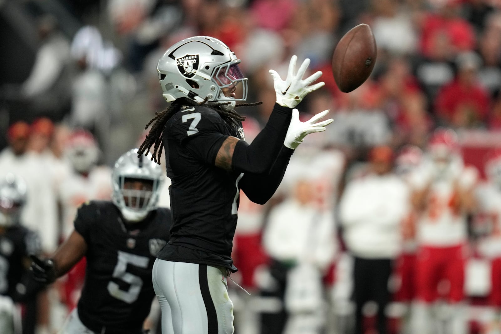 Las Vegas Raiders safety Tre'von Moehrig intercepts a pass against the Kansas City Chiefs during the second half of an NFL football game Sunday, Oct. 27, 2024, in Las Vegas. (AP Photo/John Locher)