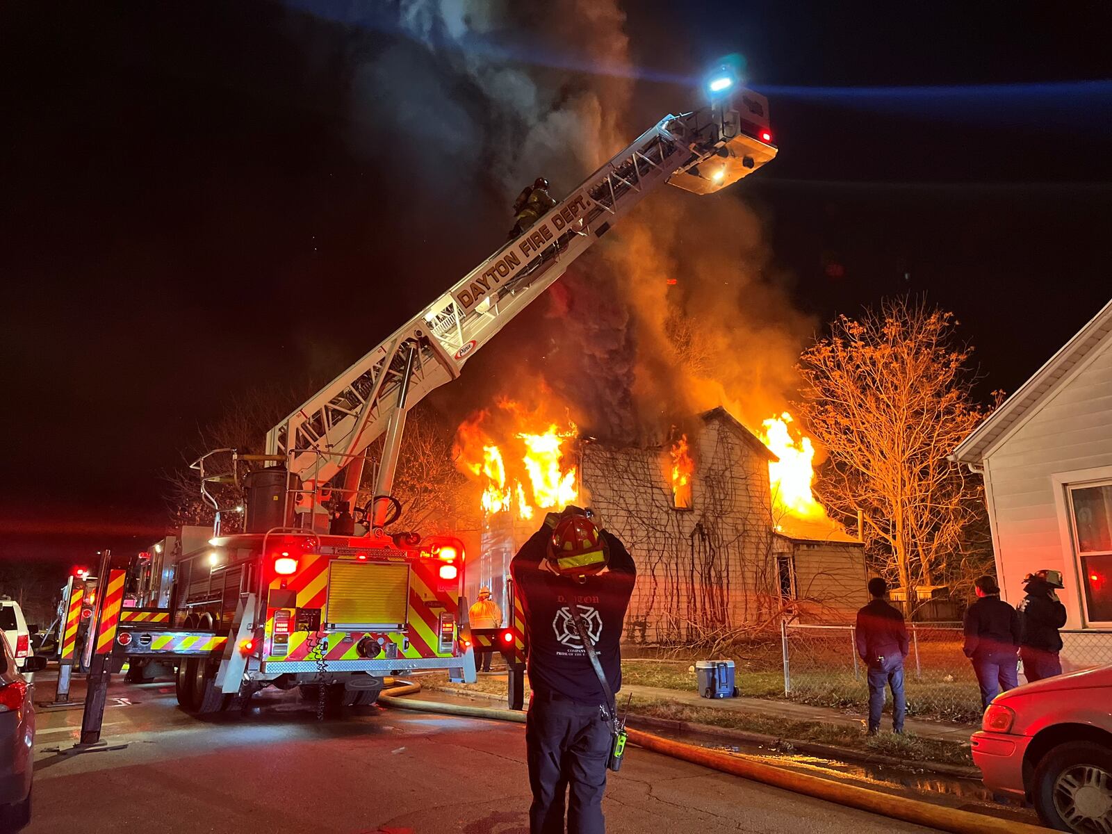 Dayton firefighters fight a house fire on Hoch Street in East Dayton in late December. CORNELIUS FROLIK / STAFF