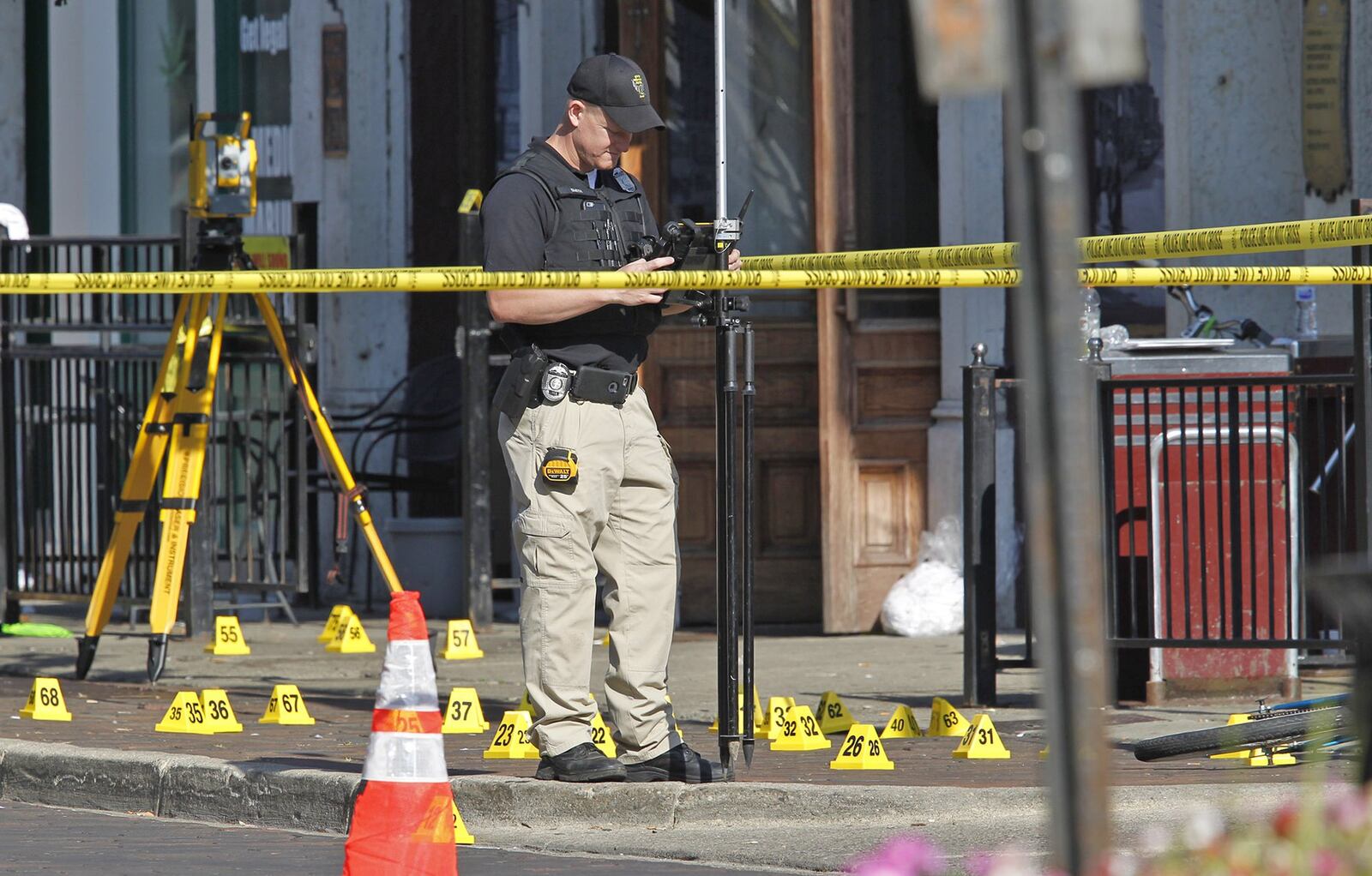 Scene in the Oregon District where 10 people were killed, including the shooter, in a mass shooting that also injured more than two dozen others. The shooting took place in the 400 block of East Fifth Street at 1:07 a.m. TY GREENLEES / STAFF