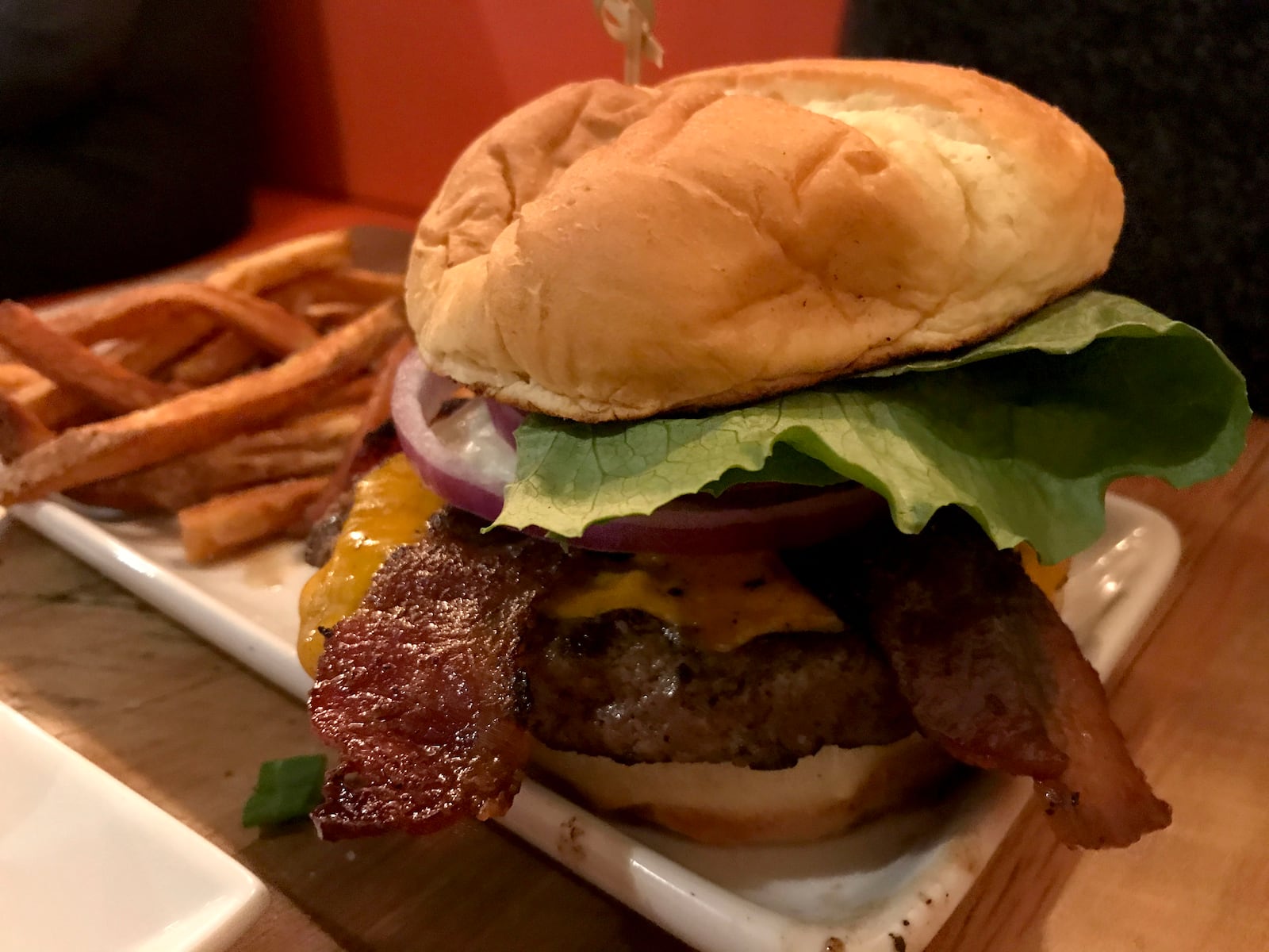 The food at Lock 27 in downtown Dayton. Pictured: Lock 27's Keener Burger served with bacon and an egg added. Photo by Amelia Robinson