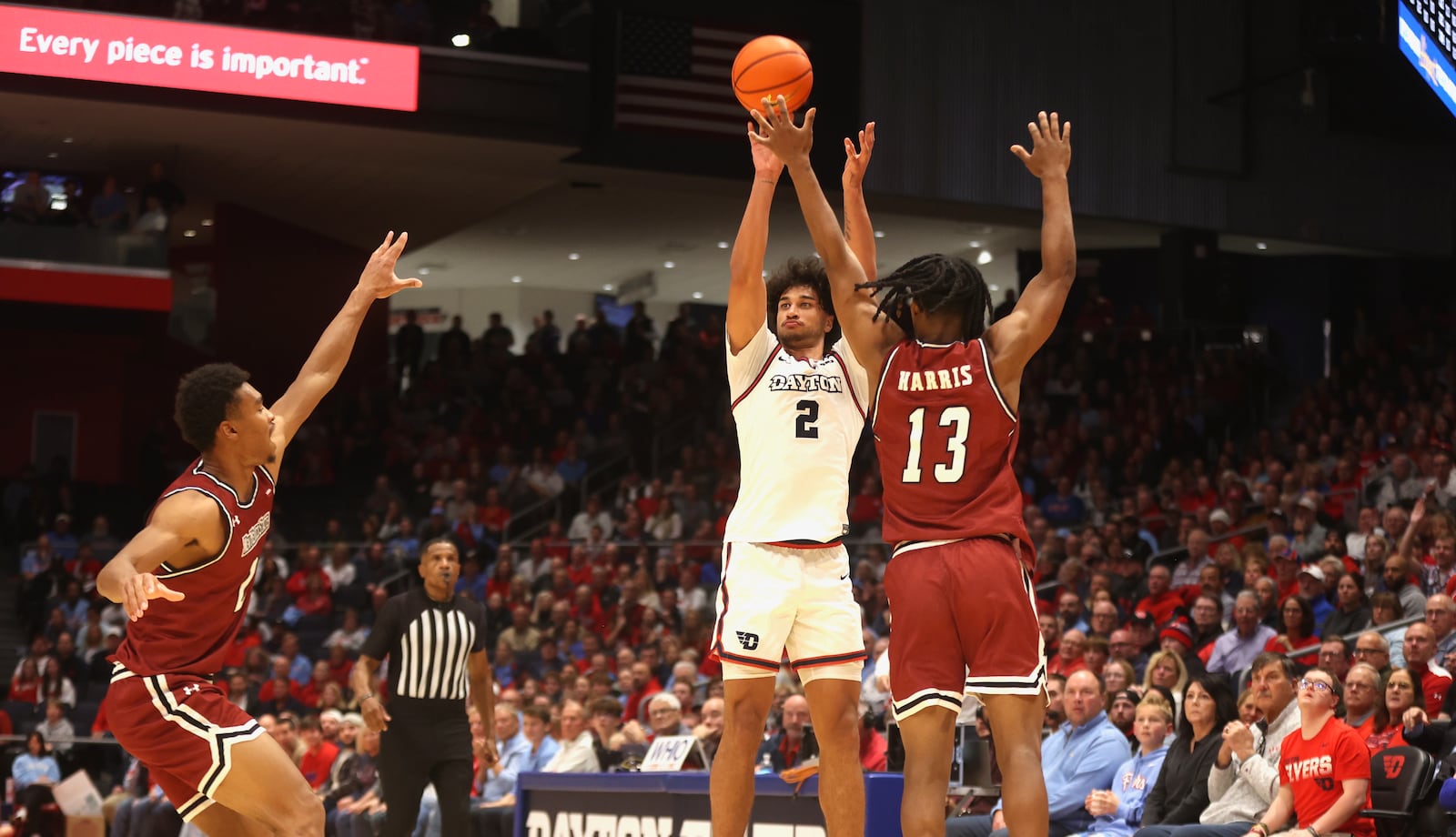 Dayton's Nate Santos makes a 3-pointer against New Mexico State on Wednesday, Nov. 20, 2024, at UD Arena. David Jablonski/Staff