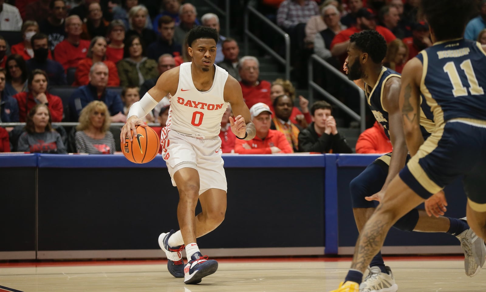 Dayton's Elijah Weaver dribbles against George Washington on Saturday, Feb. 12, 2022, at UD Arena. David Jablonski/Staff