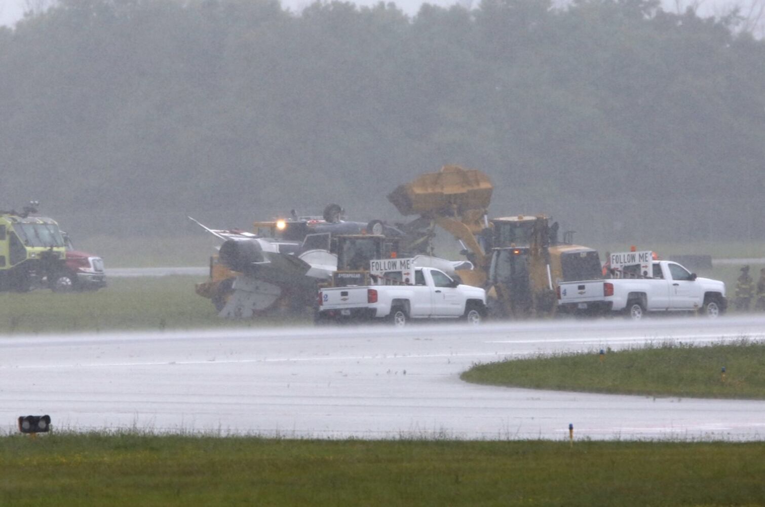 PHOTOS: Thunderbird flips on its top at Dayton Air Show