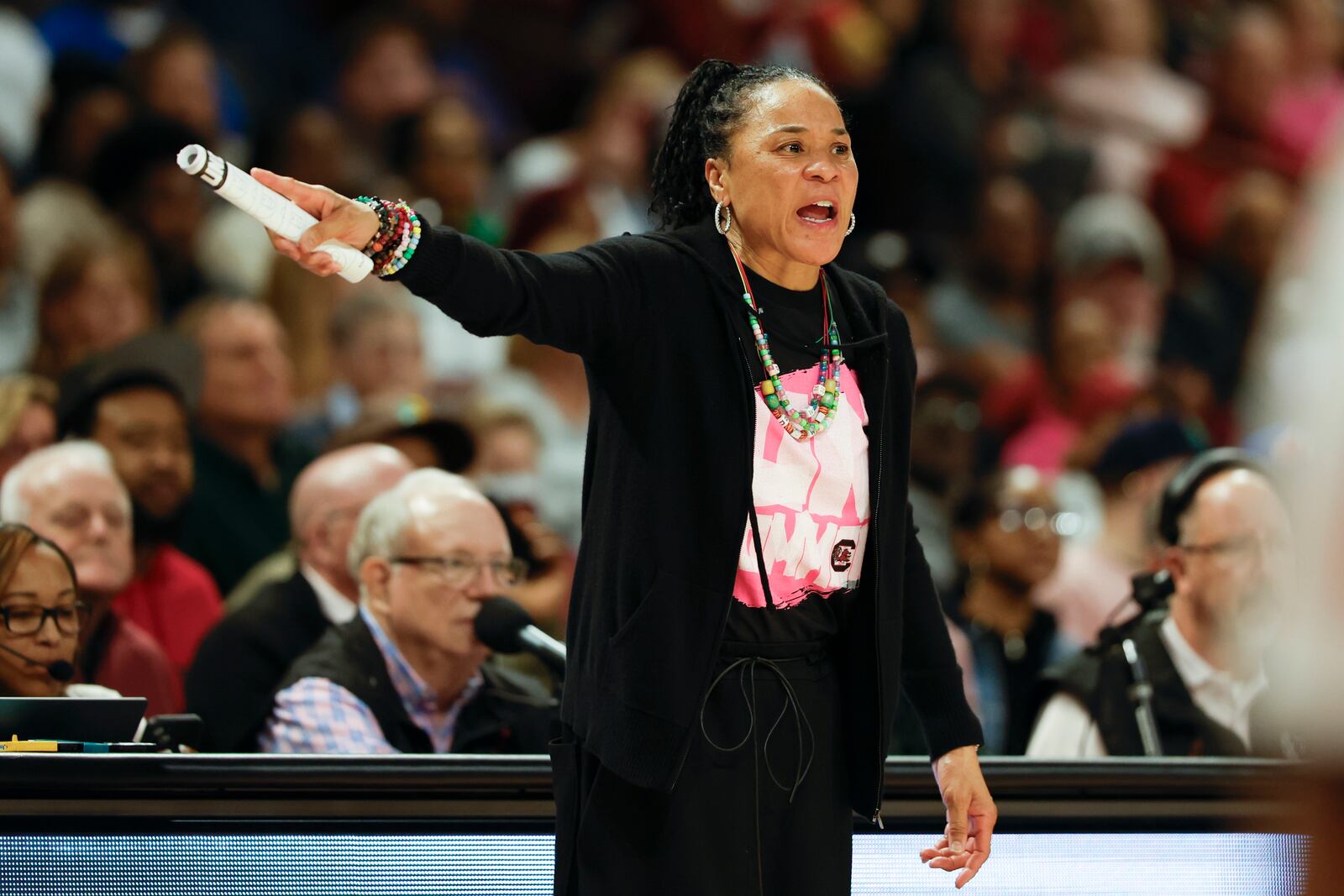 South Carolina head coach Dawn Staley directs her team against Florida during the second half of an NCAA college basketball game in Columbia, S.C., Thursday, Feb. 13, 2025. (AP Photo/Nell Redmond)