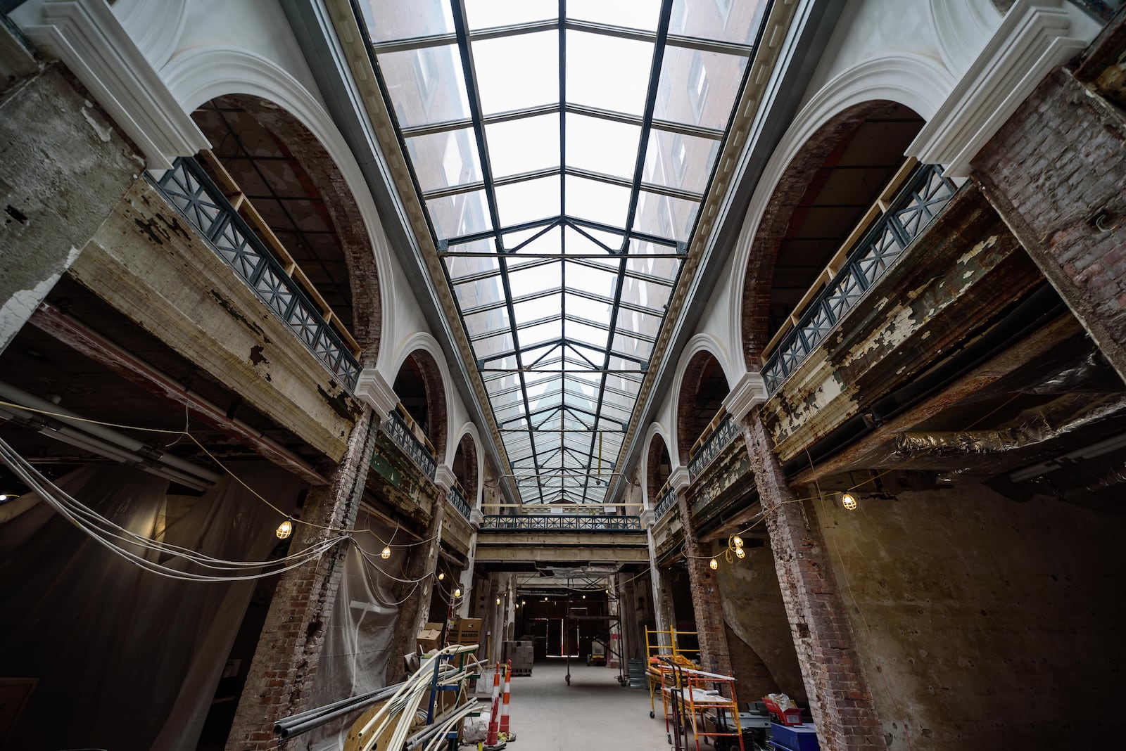 Here’s a Spring 2024 look at construction progress of the Dayton Arcade’s North Arcade in downtown Dayton. The North Arcade includes the Third Street and Gibbons Buildings, a second phase of development that will include a marketplace retail environment and a 94-room Hilton Garden Inn, projected to open in early 2025. TOM GILLIAM / CONTRIBUTING PHOTOGRAPHER