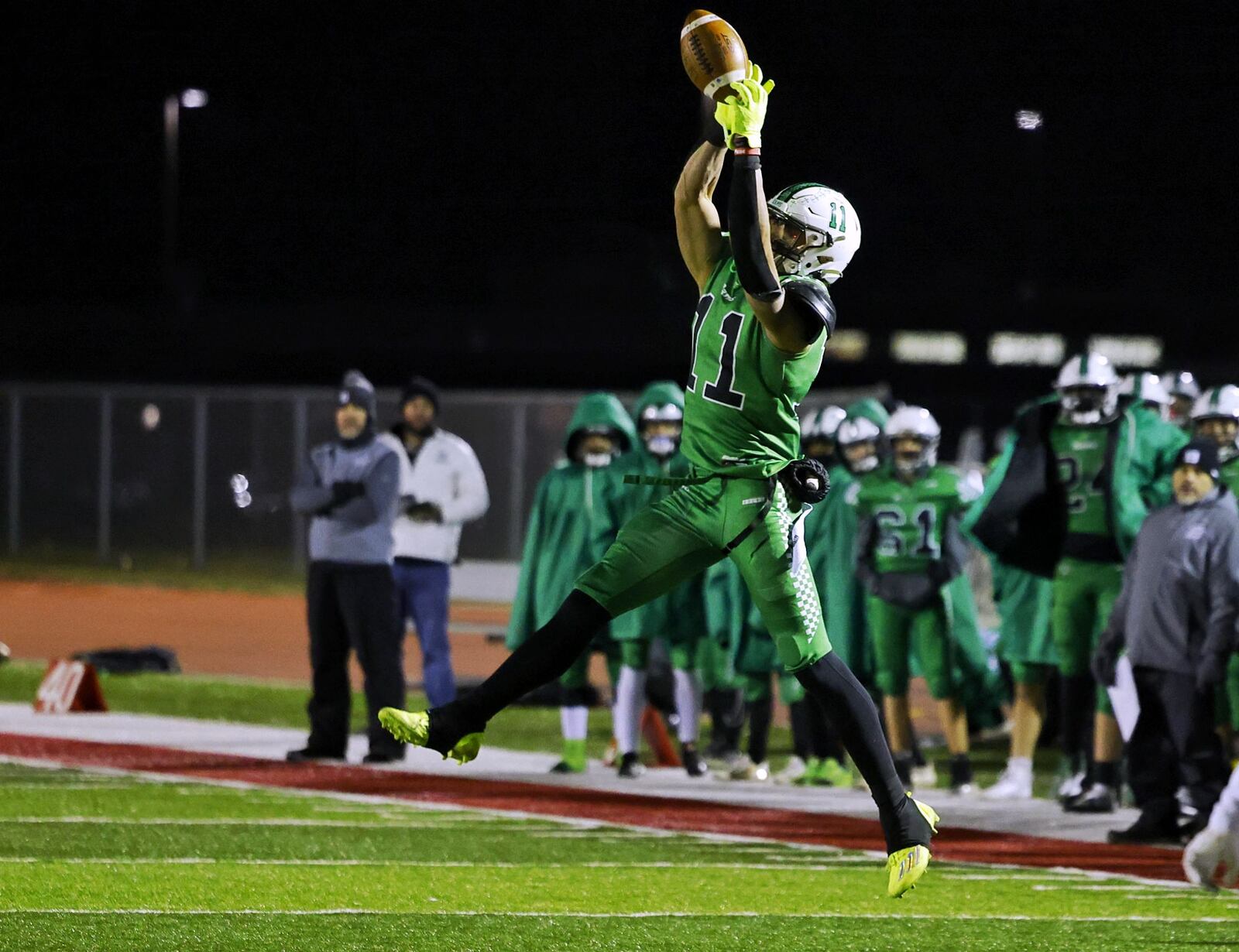 Badin's Braedyn Moore jumps for a catch during a 20-17 loss to Tippecanoe in their Division III Regional Final football game Friday, Nov. 18, 2022 at Trotwood-Madison High School. Moore will play college football at Wisconsin. NICK GRAHAM/STAFF