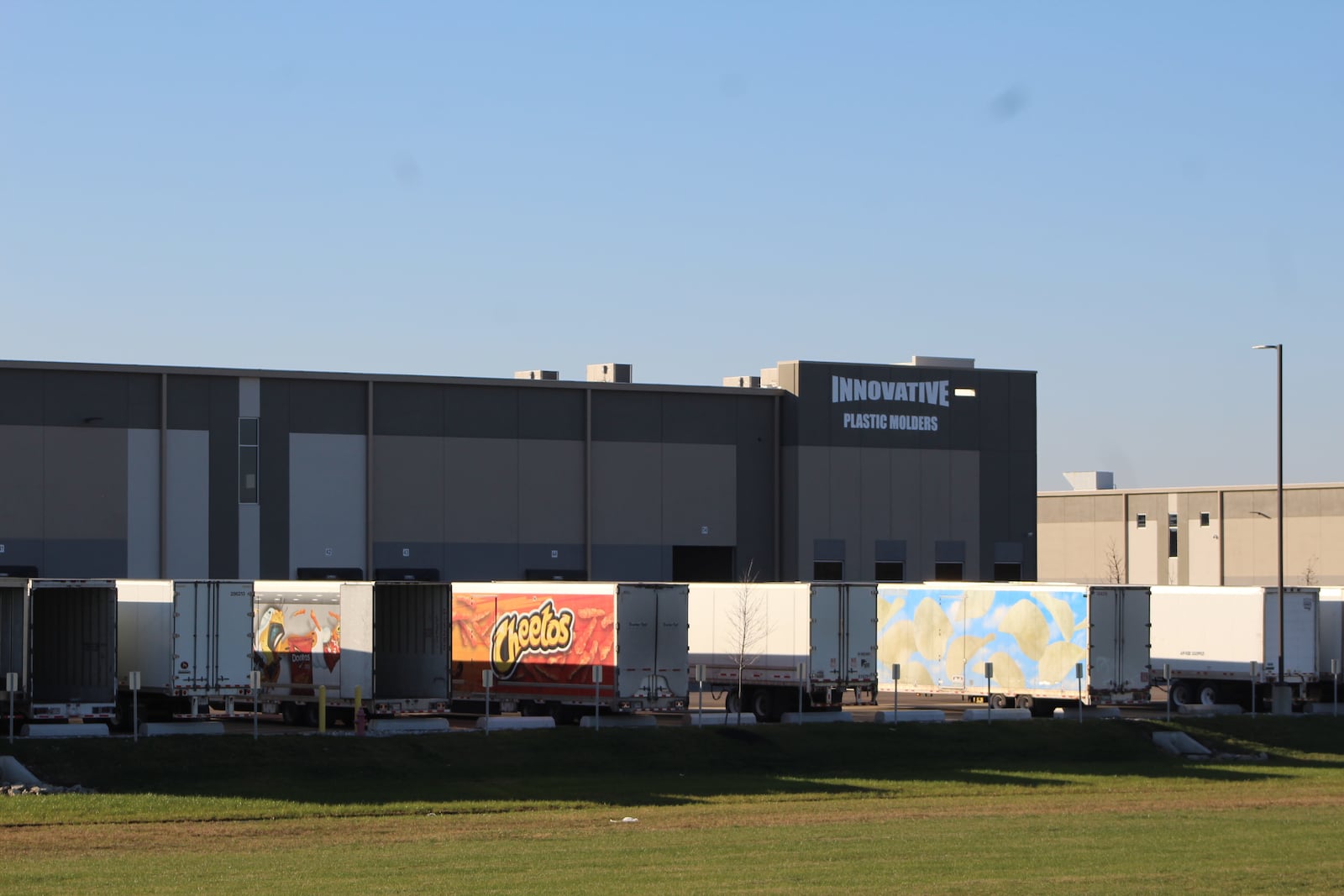 Frito-Lay tractor trailers parked near Innovative Plastic Molders. Both companies occupy space in Building III in the Park 70/75 industrial park. CORNELIUS FROLIK / STAFF